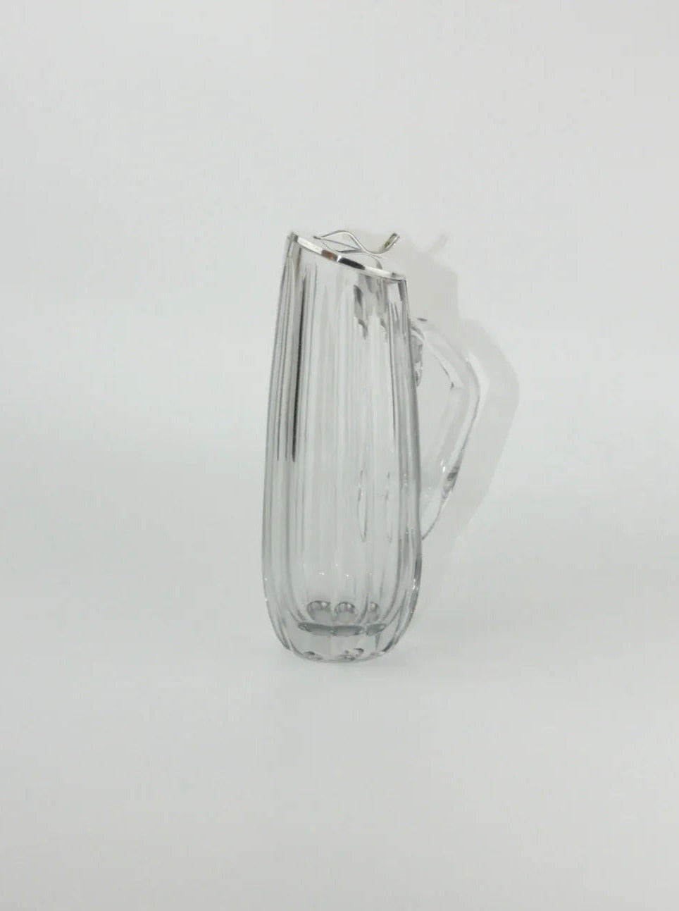  Luxurious crystal decanter with a sleek and modern shape, perfect for serving fine wines