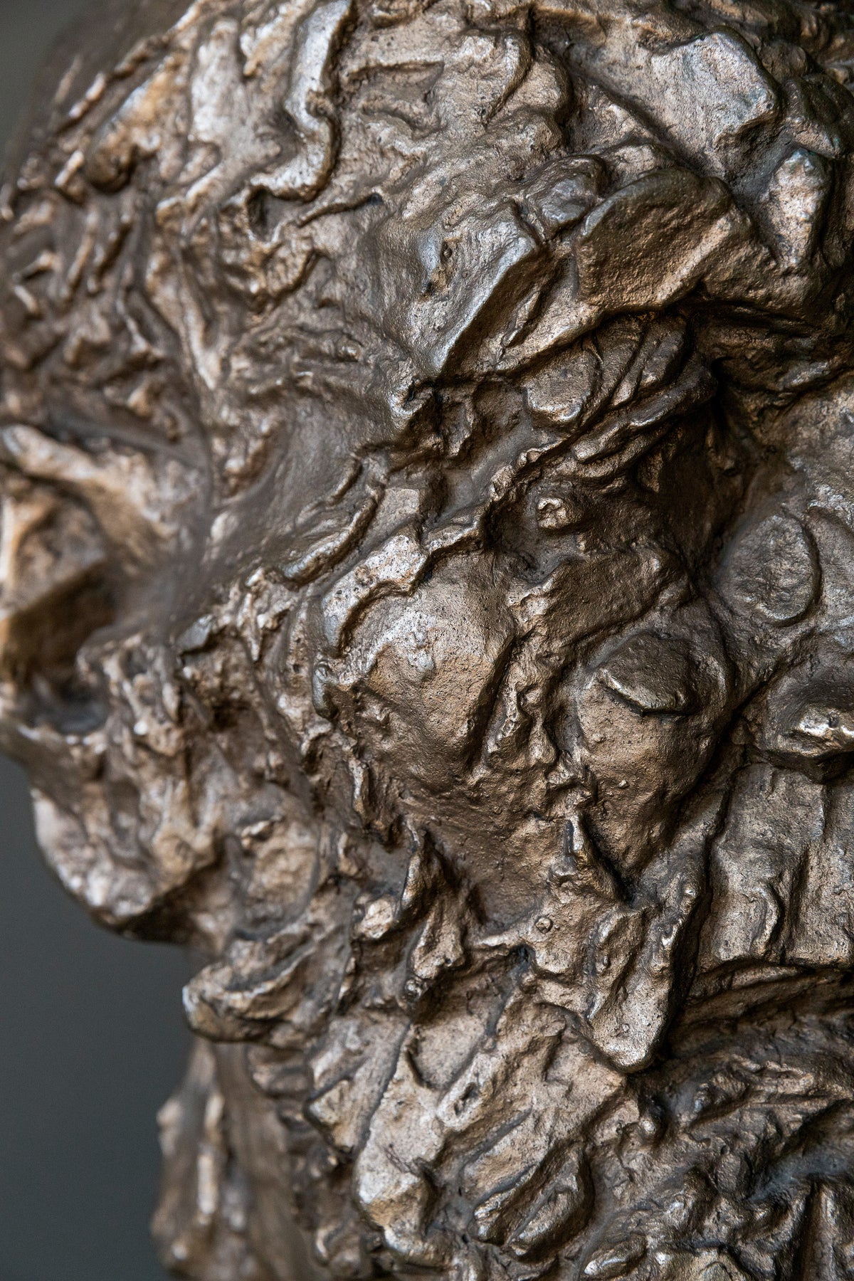 Vintage Bronze Sculpture 60s — close-up of textured bronze surface