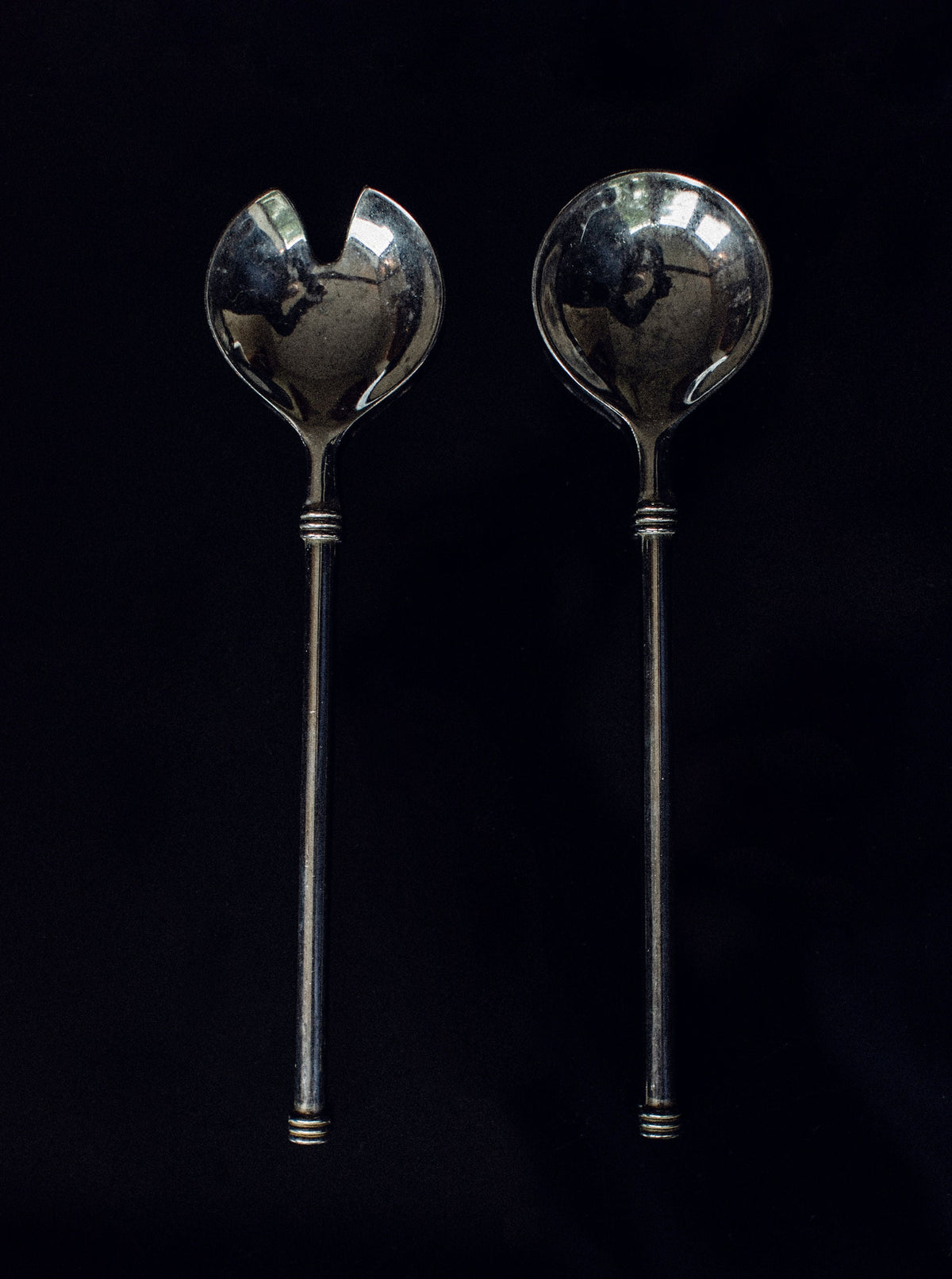 Luxurious Art Deco flatware set with polished mirror finish and timeless design