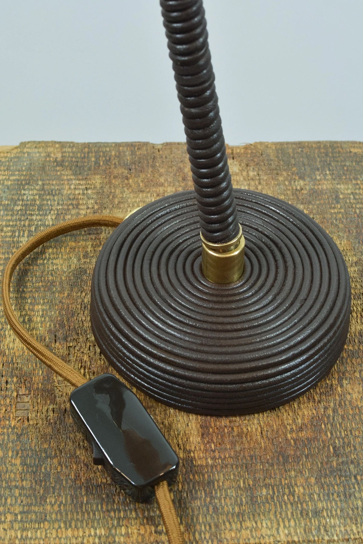 L'Escargot table lamp base detail with spiral ridged design