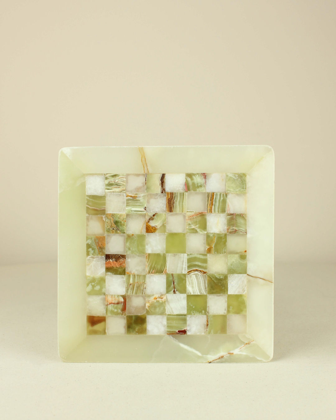 Elegant green onyx chess board with translucent squares