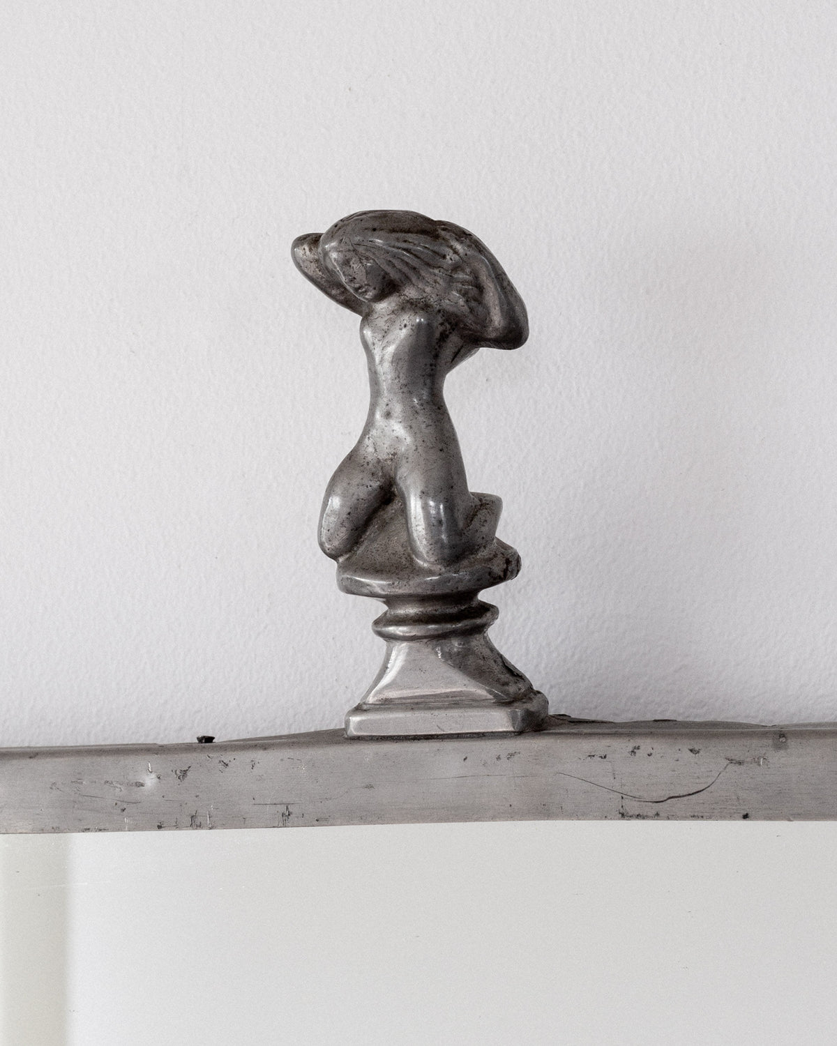 Art Deco pewter figurine finial detail from 1930s Swedish mirror