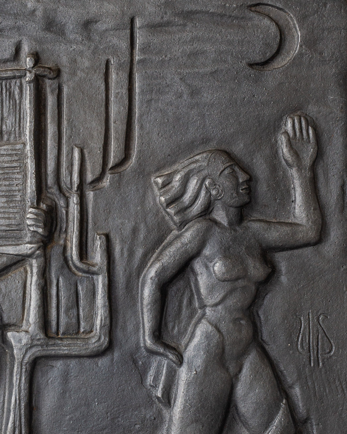 Cast iron wall relief detail showing sculptural figures by Ulla Fogelklou-Skogh