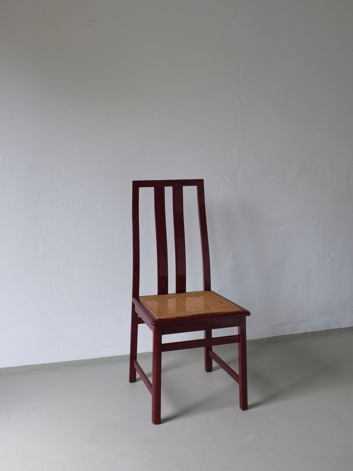 Single glossy wine red cane seat chair Italian 1970s design