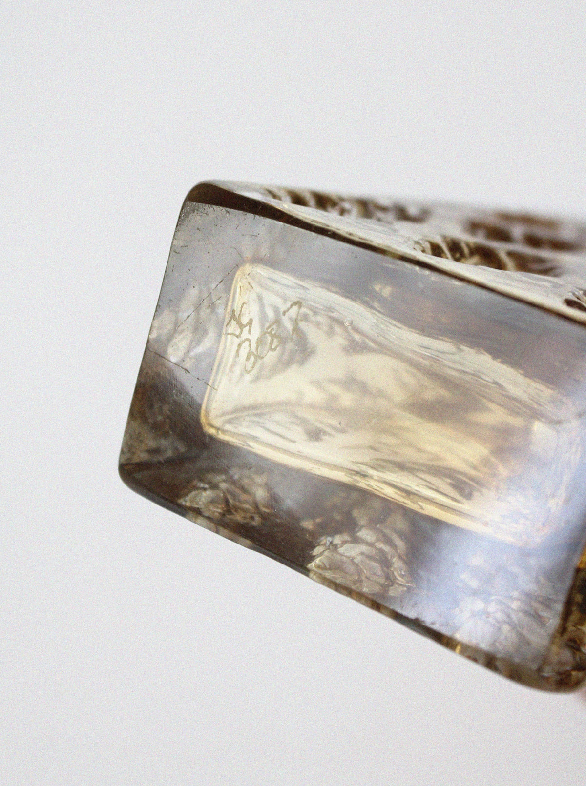 Crystal amber glass vase detail showing translucent material texture