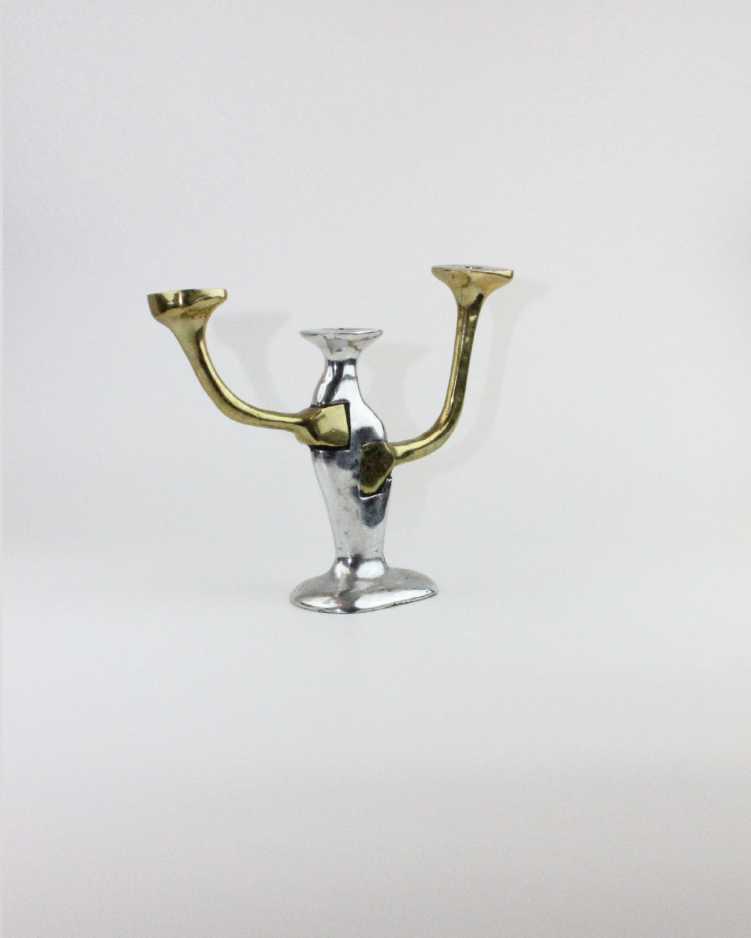 Brutalist three-arm brass and chrome candleholder from 1970s