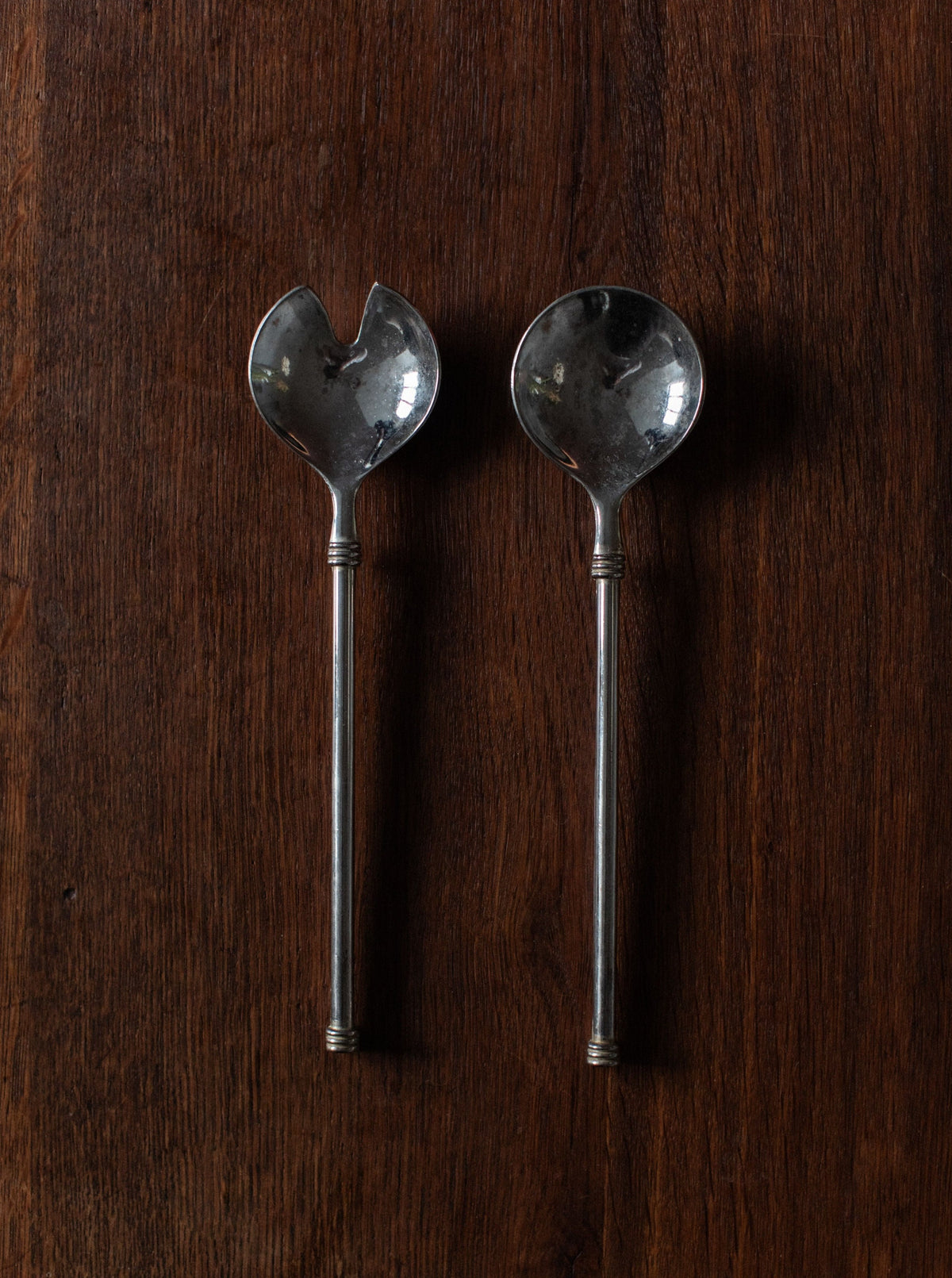 Art-Deco-inspired stainless steel cutlery set with geometric handles and sleek design
