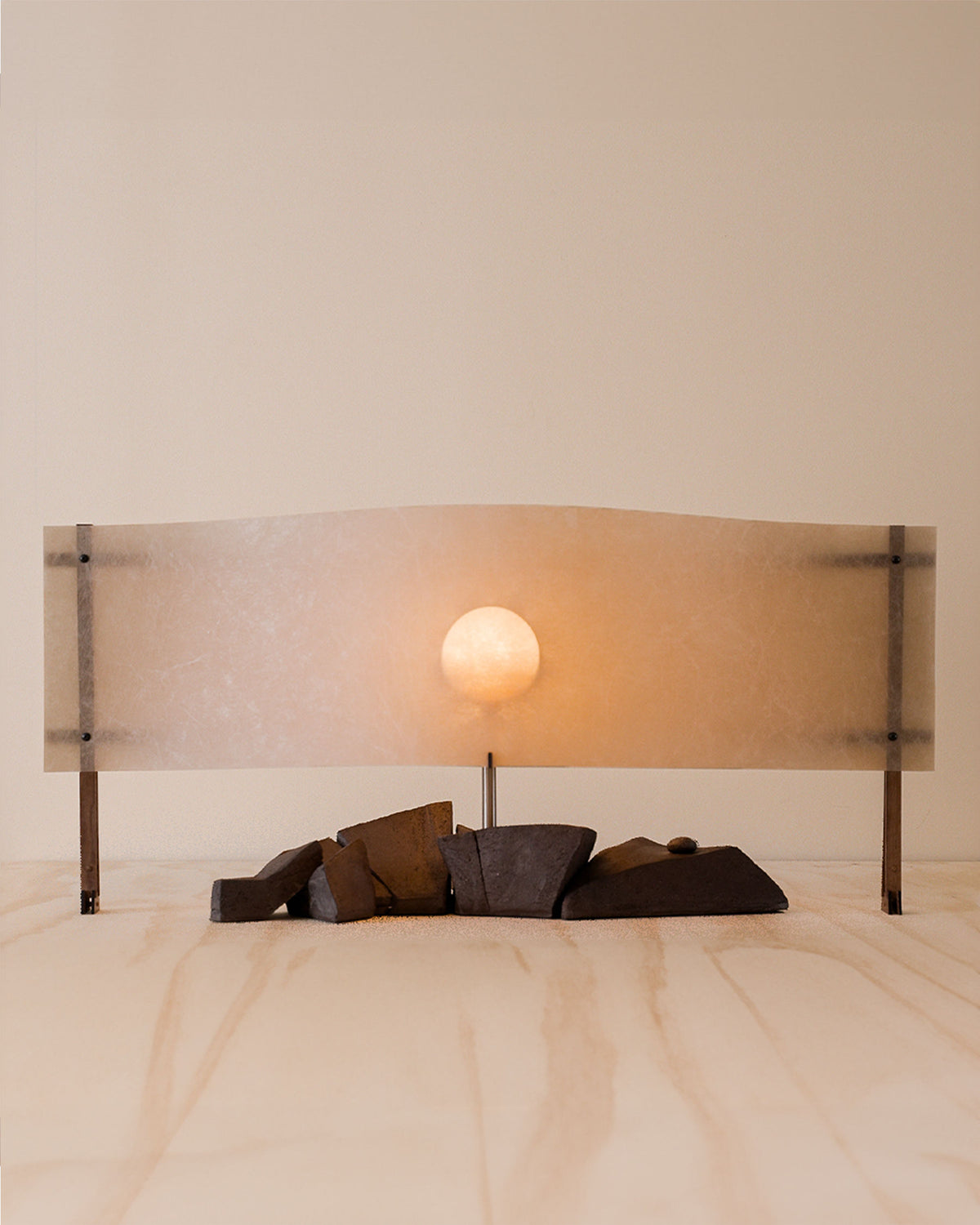 Sunrise table lamp with frosted glass shade and warm glowing orb