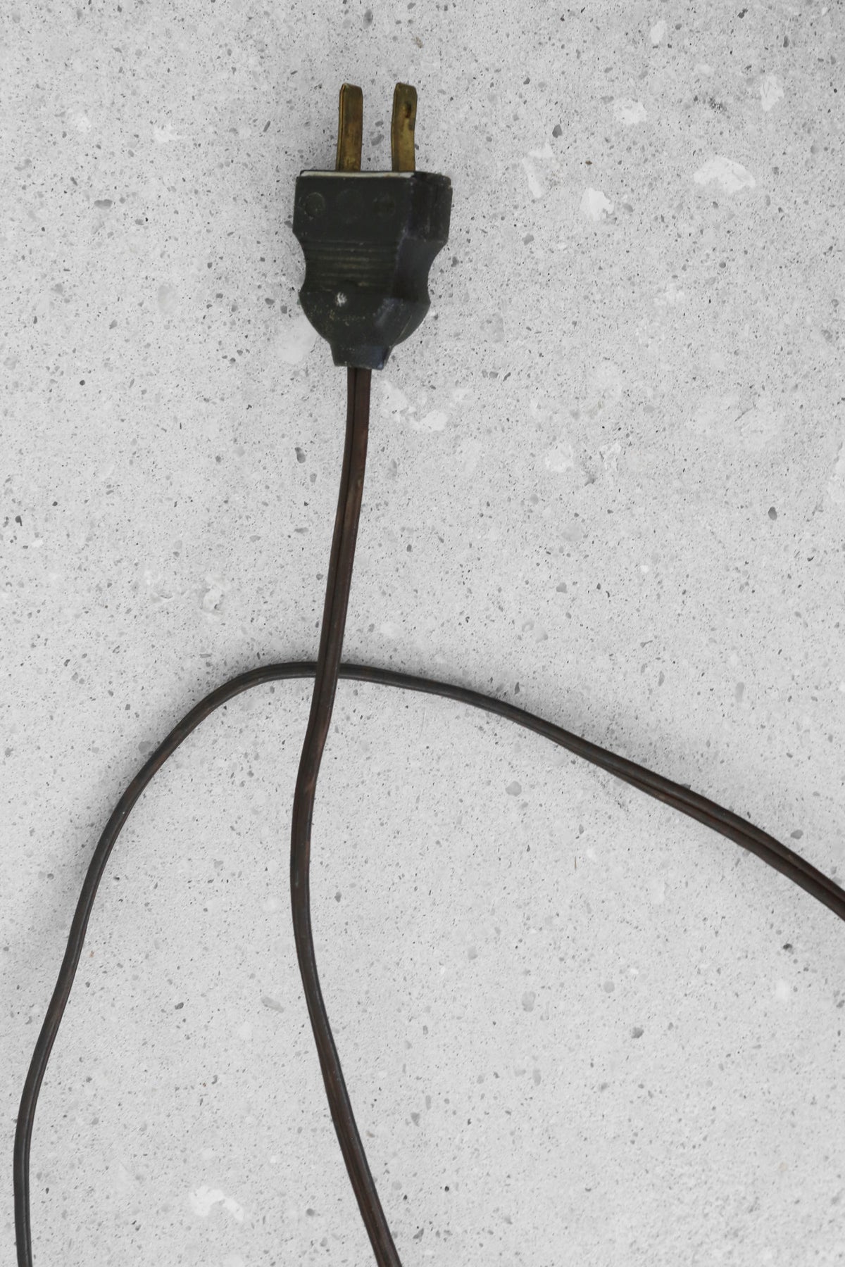 Black electrical plug and cord detail of Scandi floor lamp
