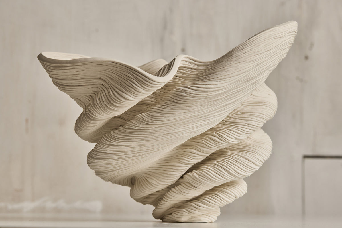 Flutter ceramic vase with layered ribbed texture detail view