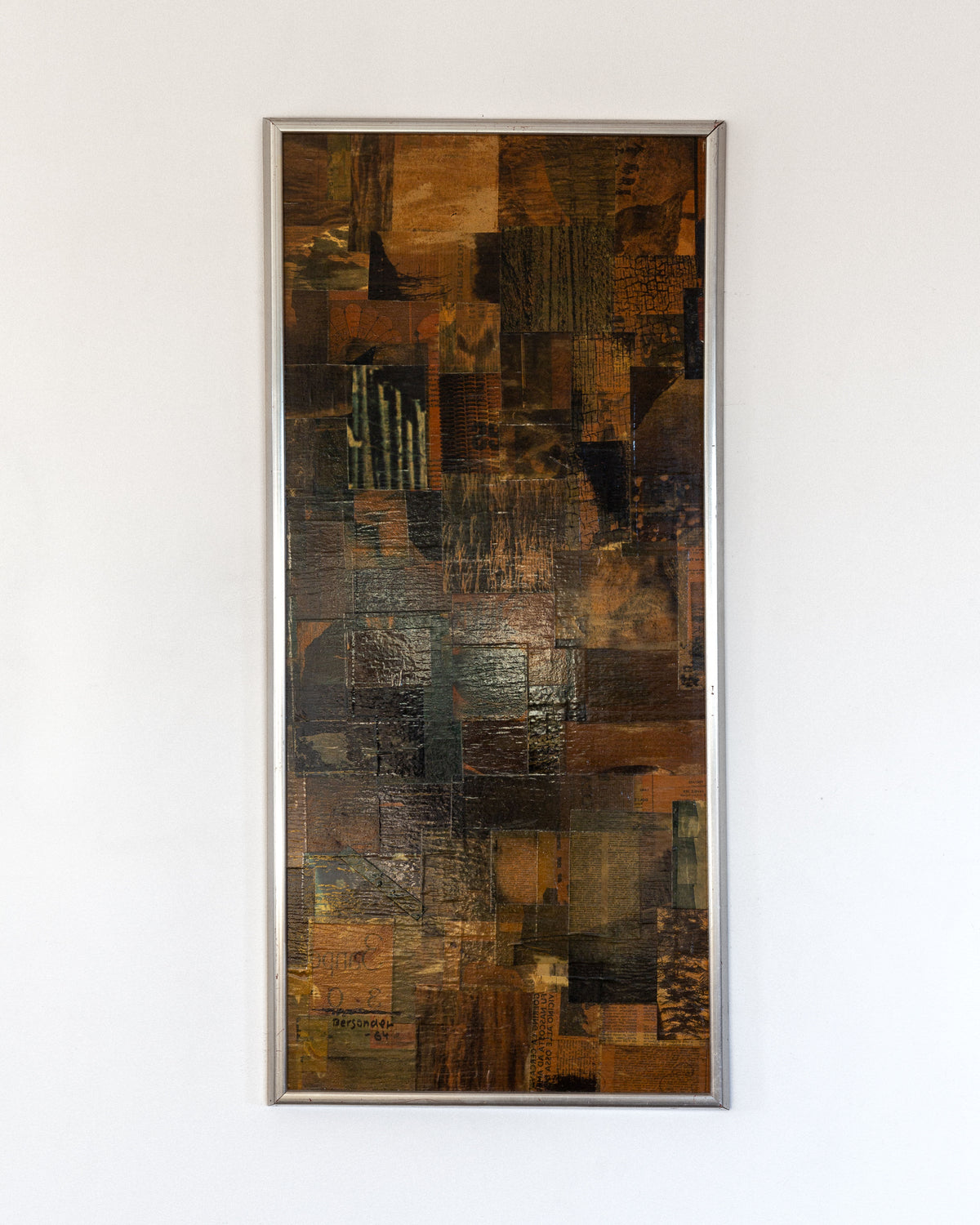 The Mid-Century Abstract Collage Artwork by Spigel, created in 1964 in Sweden, features an abstract patchwork by Lars Bergander. It showcases brown, green, and black rectangles that evoke a mid-century modernist vibe with textured pieces framed in a thin metallic border on a white wall.
