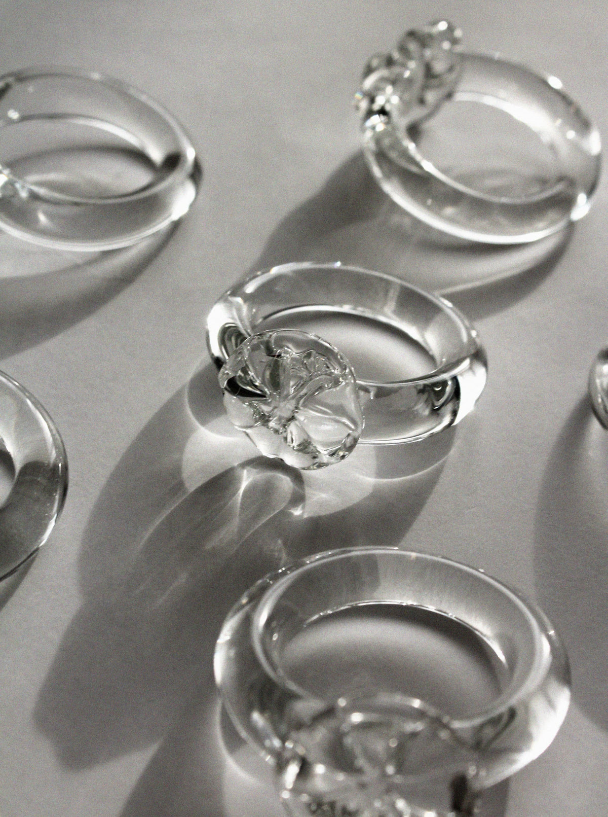 Close-up detail of vintage glass napkin rings with crystal clarity