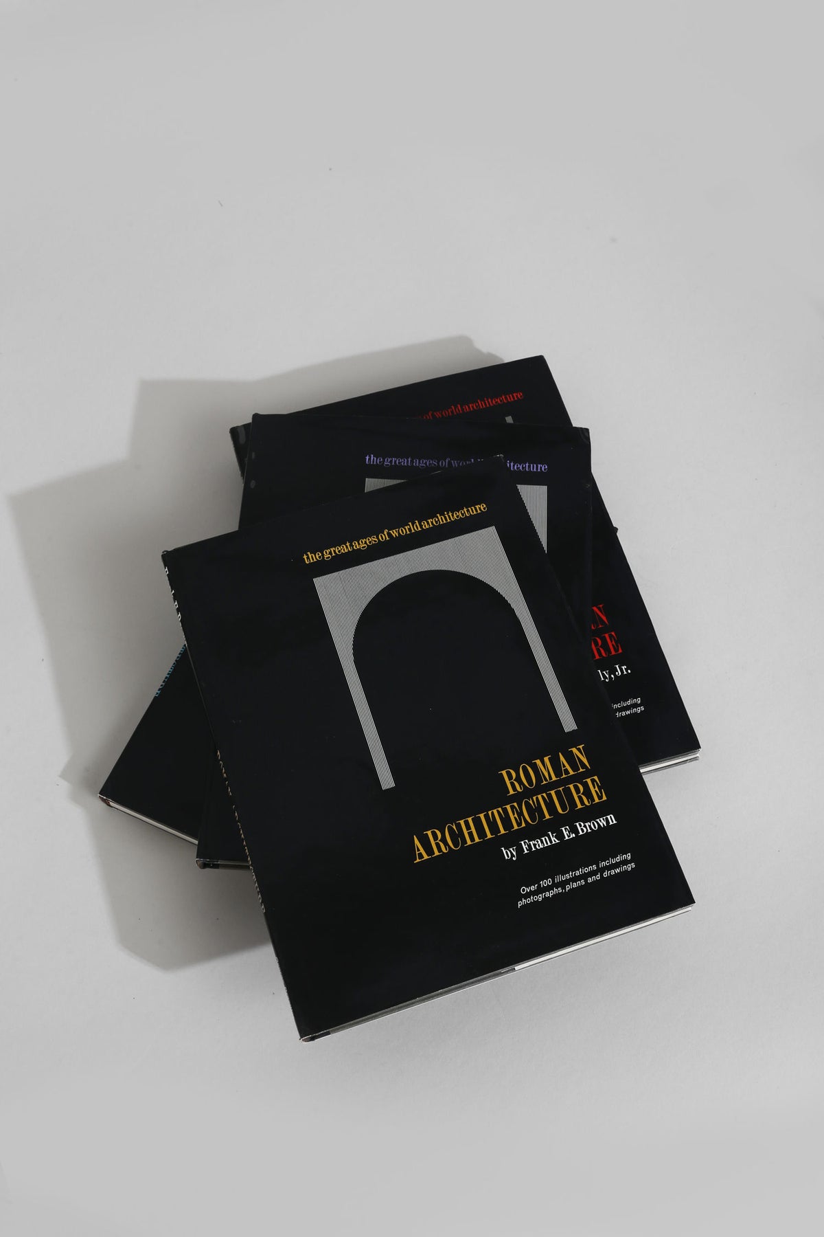 Stack of black architecture books from Great Ages of World Architecture set