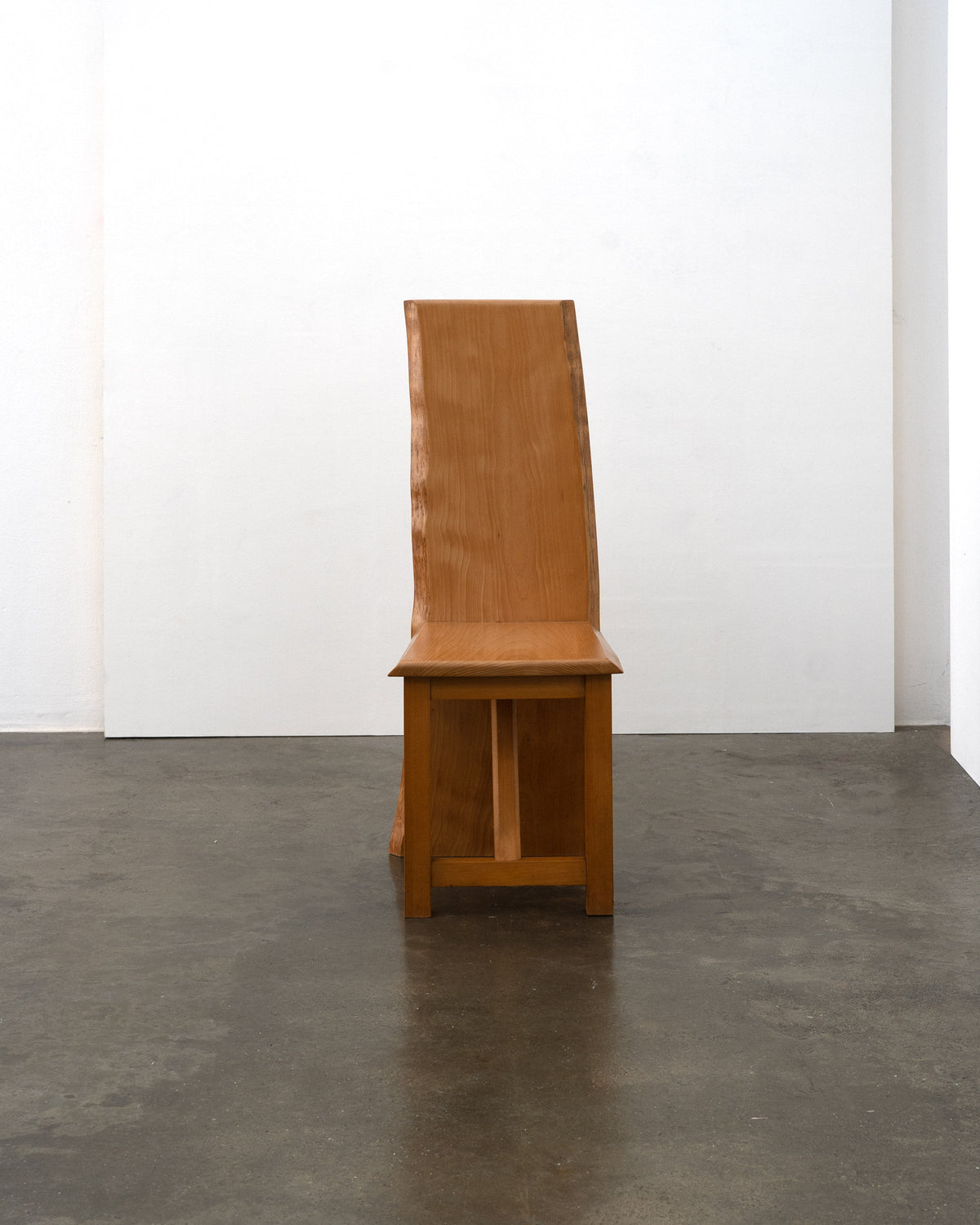Postmodern live edge wood high back chair side profile view