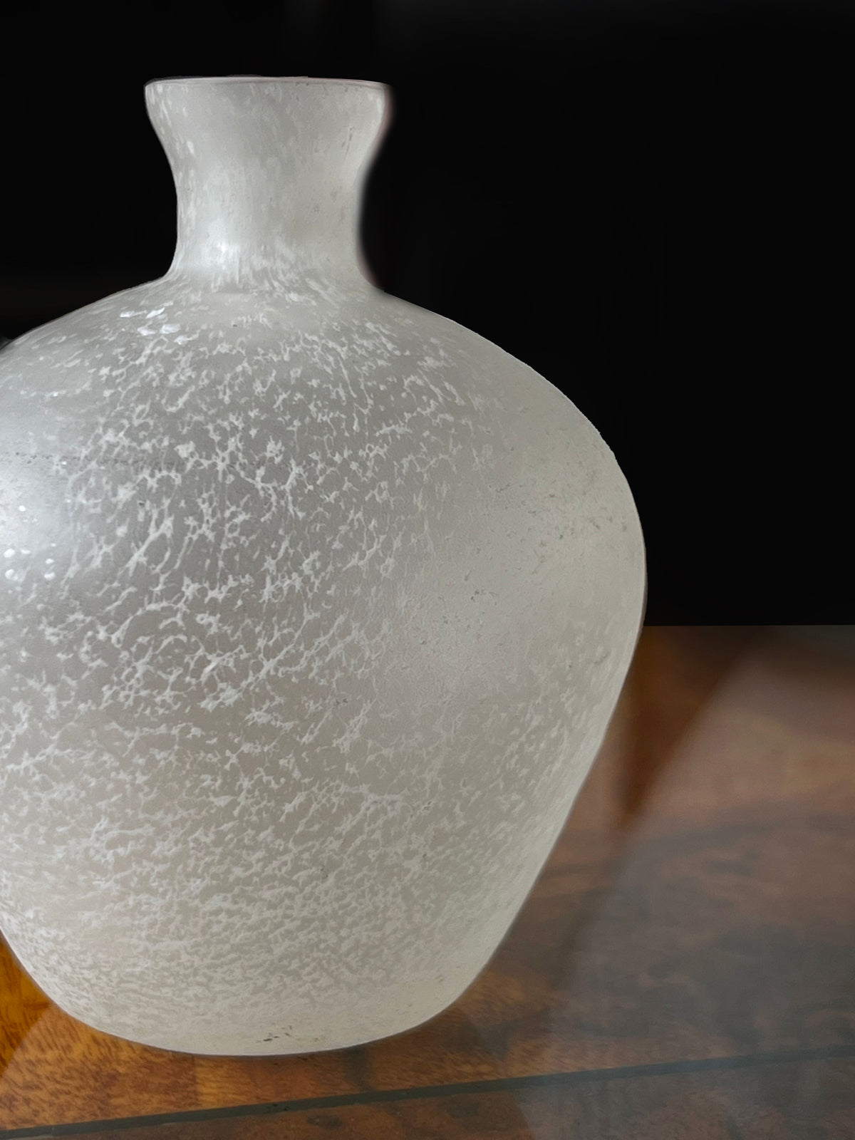 Frosted glass vase with textured crystalline surface detail