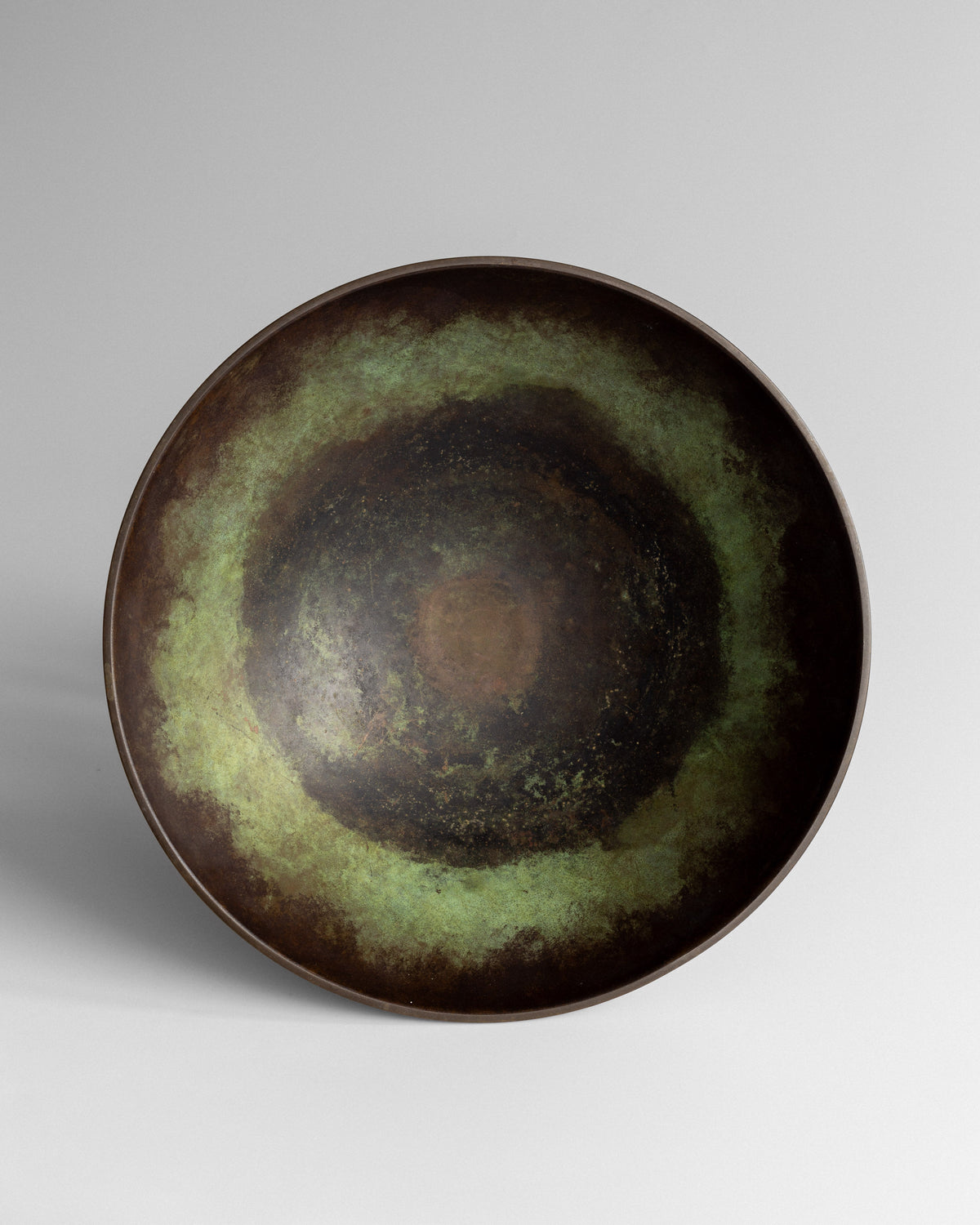 Interior view of Swedish Art Deco bronze bowl showing patina detail