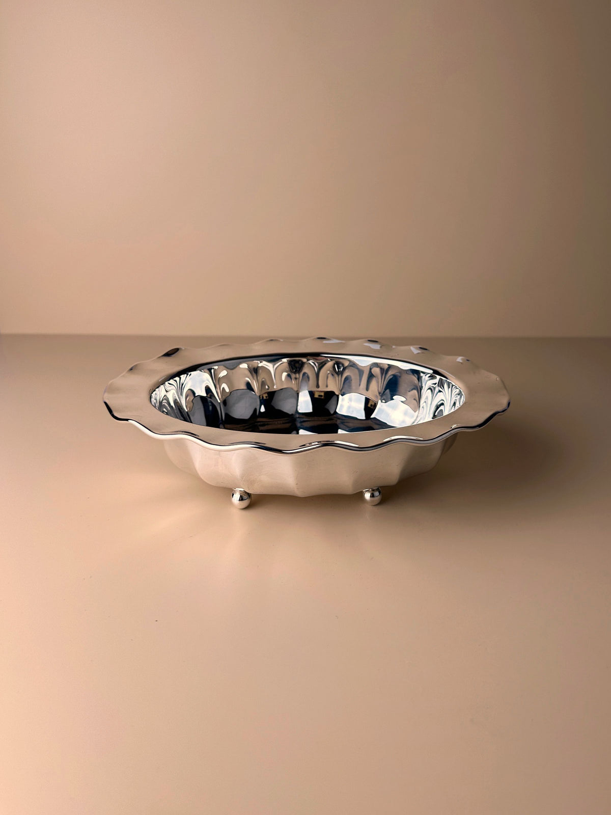  Vintage Italian bowl with silver plating, showcasing the timeless mid century craftsmanship