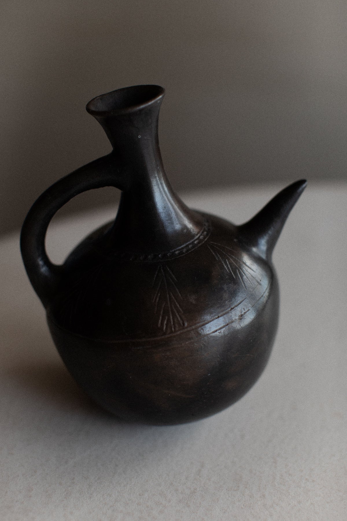 Ethiopian Teapot in earthy tones with a lid and wide base
