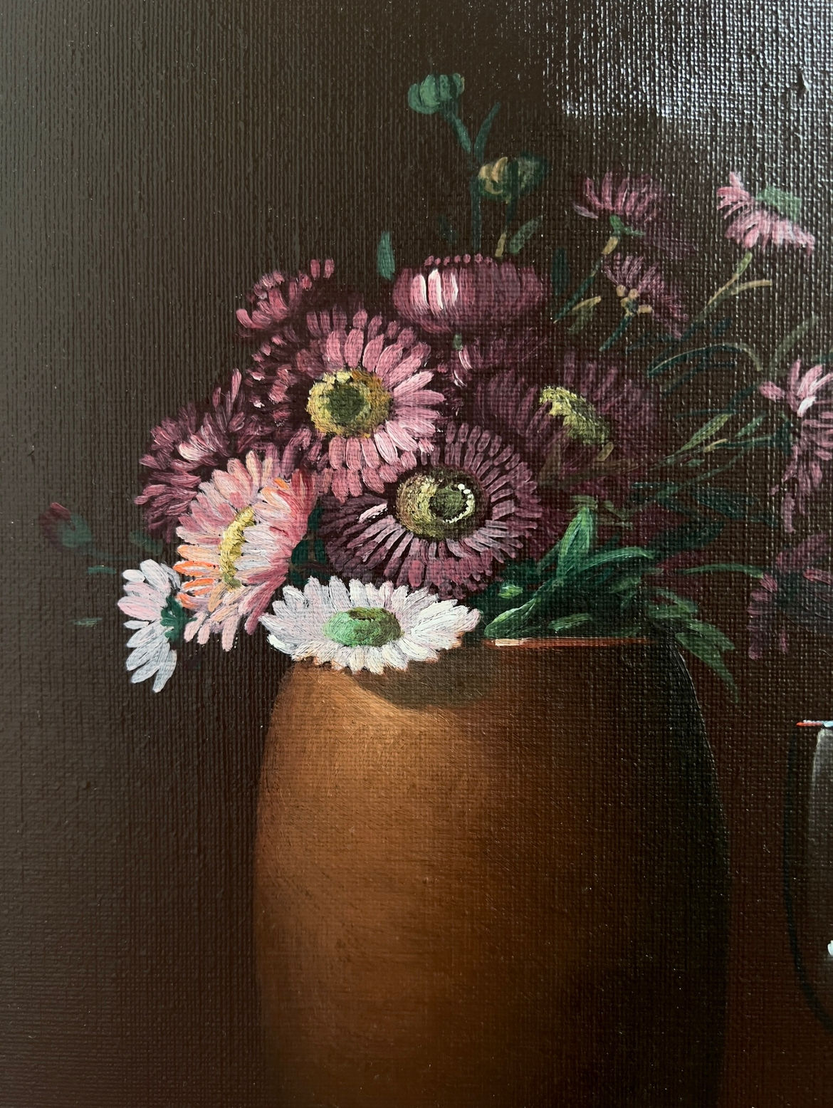 Veter Vintage’s "Still Life Painting by Jan Palmu, Finland 1986" features a brown vase with pink, purple, and white flowers on green stems against a dark backdrop, with visible canvas texture in a realistic Finnish style.
