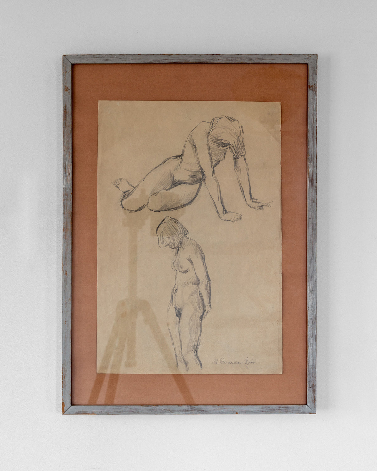The "Nude Drawing Study II, 1940s" by Spigel offers a framed sketch by Harriet Rosander de Tourtchaninoff, showcasing one kneeling and one slightly tilted standing figure. Elegantly mounted on a brown matte, the artwork features a simply designed wooden frame.