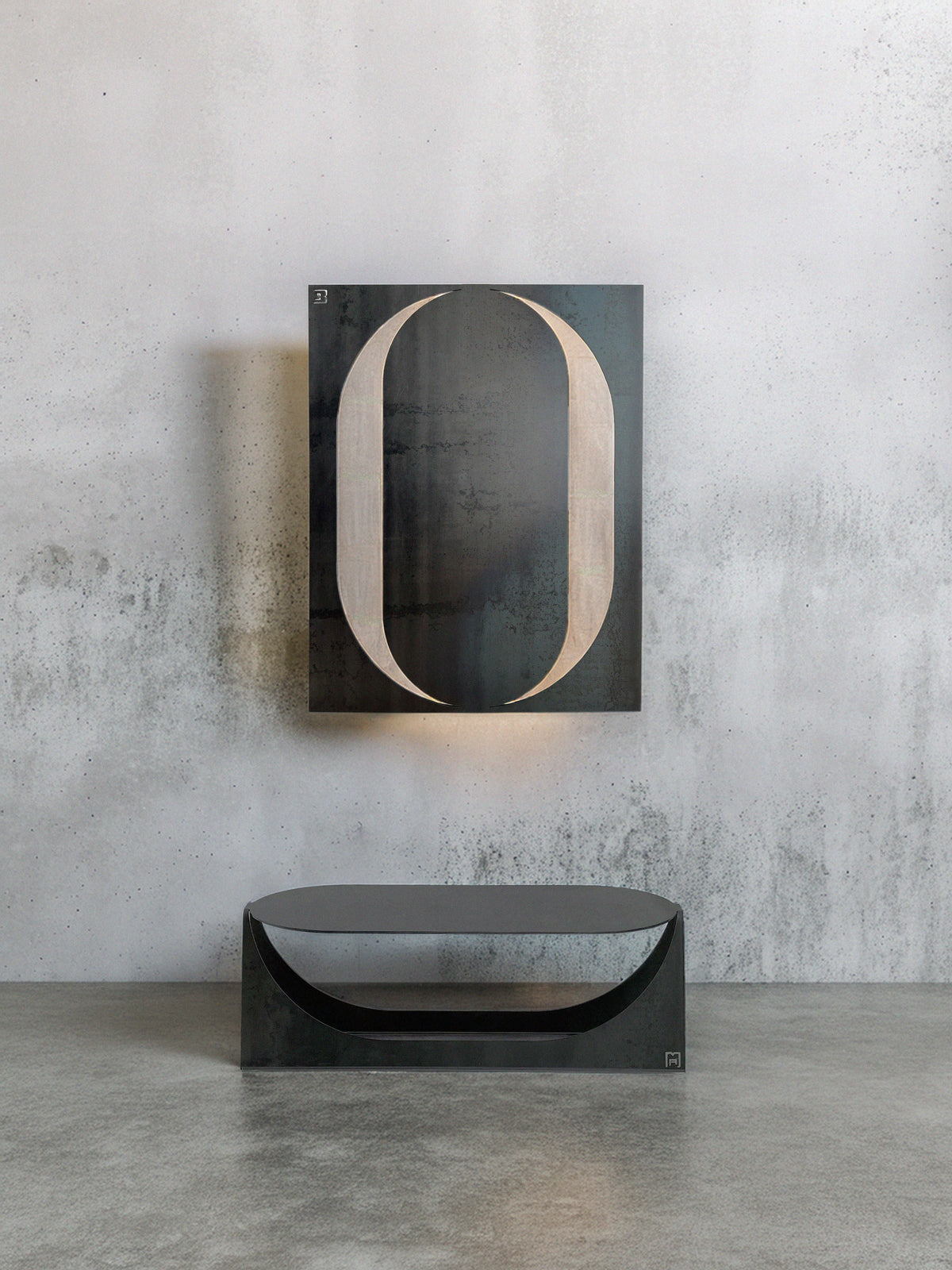 A minimalist interior featuring Modan's 'Tani' Coffee Table with a curved cutout design sits beneath a large abstract metallic oval artwork on a textured wall, creating a unique focal point along the sleek concrete floor.