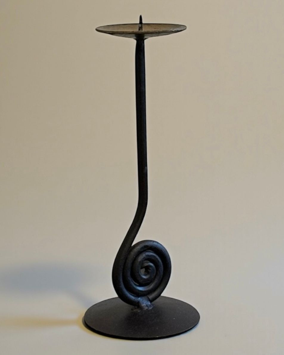 Black iron candle holder with elegant spiral base design