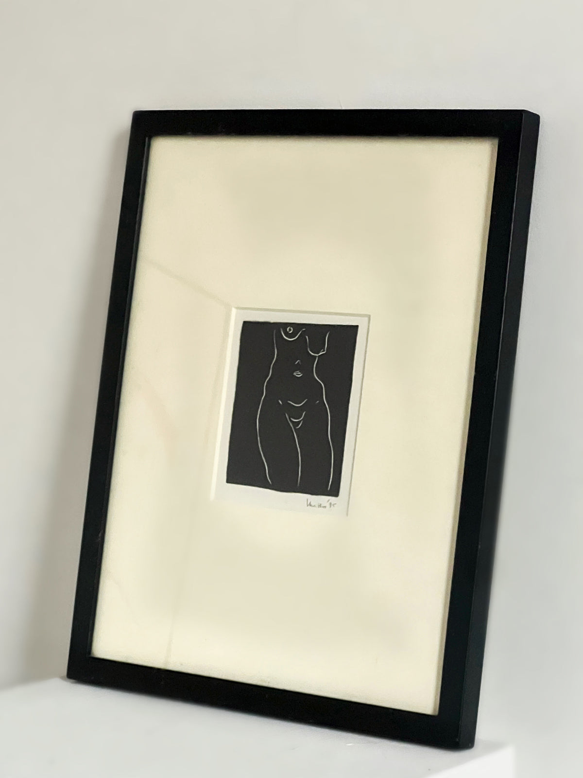 Framed Matteo Adinolfi minimalist nude figure print on cream mat