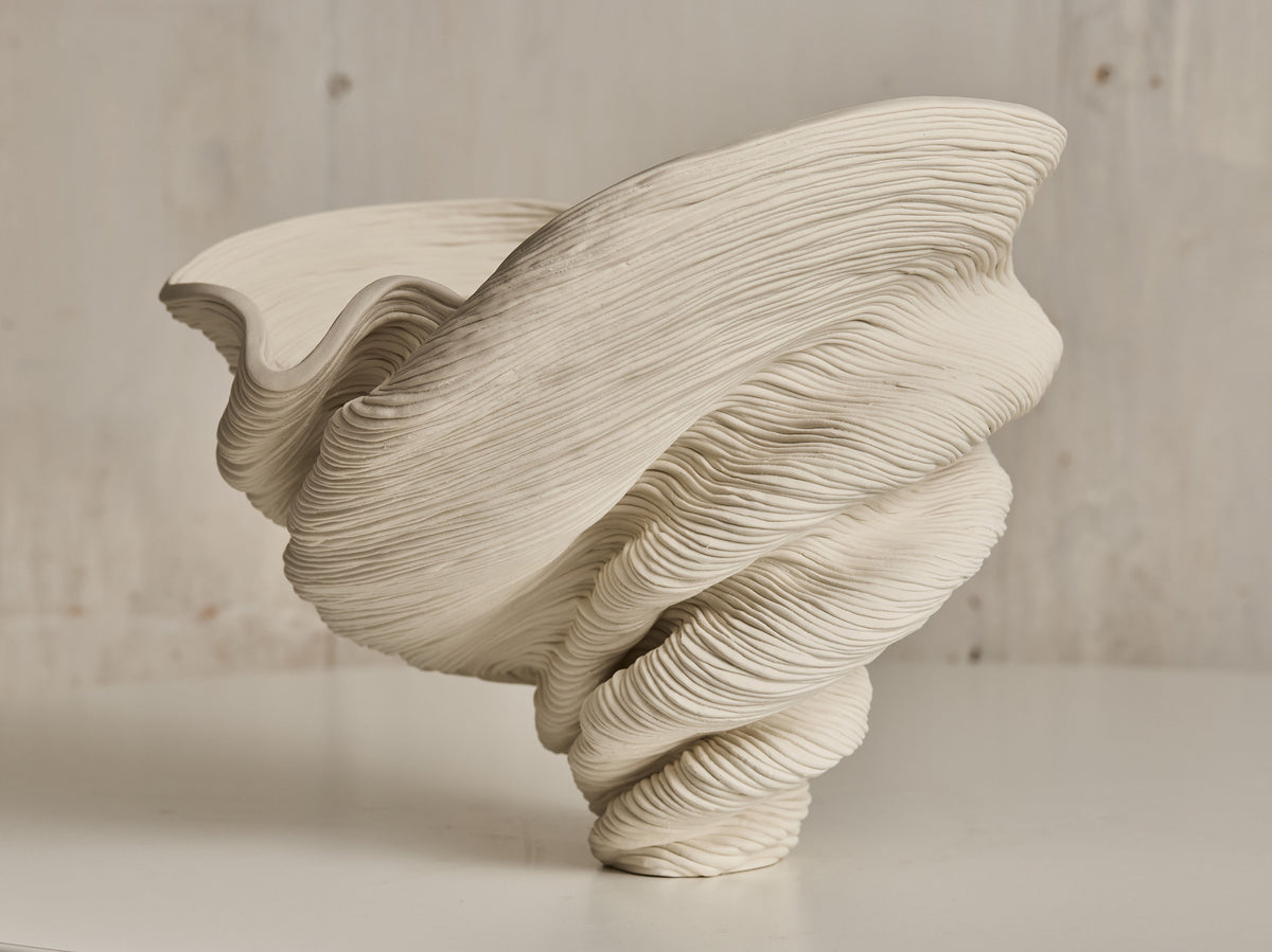 Sculptural Flutter ceramic vase with flowing ridged layers detail