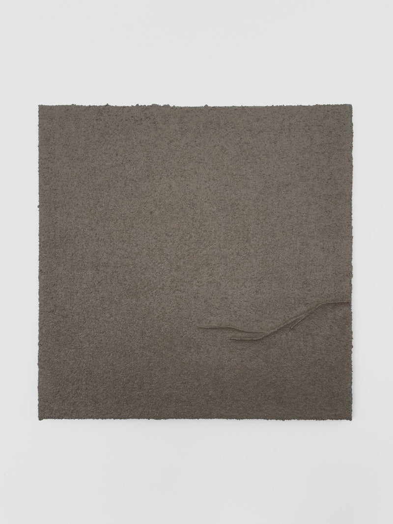 Shadow World 04 by Delal Salazar is a limited edition piece featuring acrylic and sand on canvas. The square dark brown artwork has rough edges and a raised, curving line from the lower right corner toward the center.
