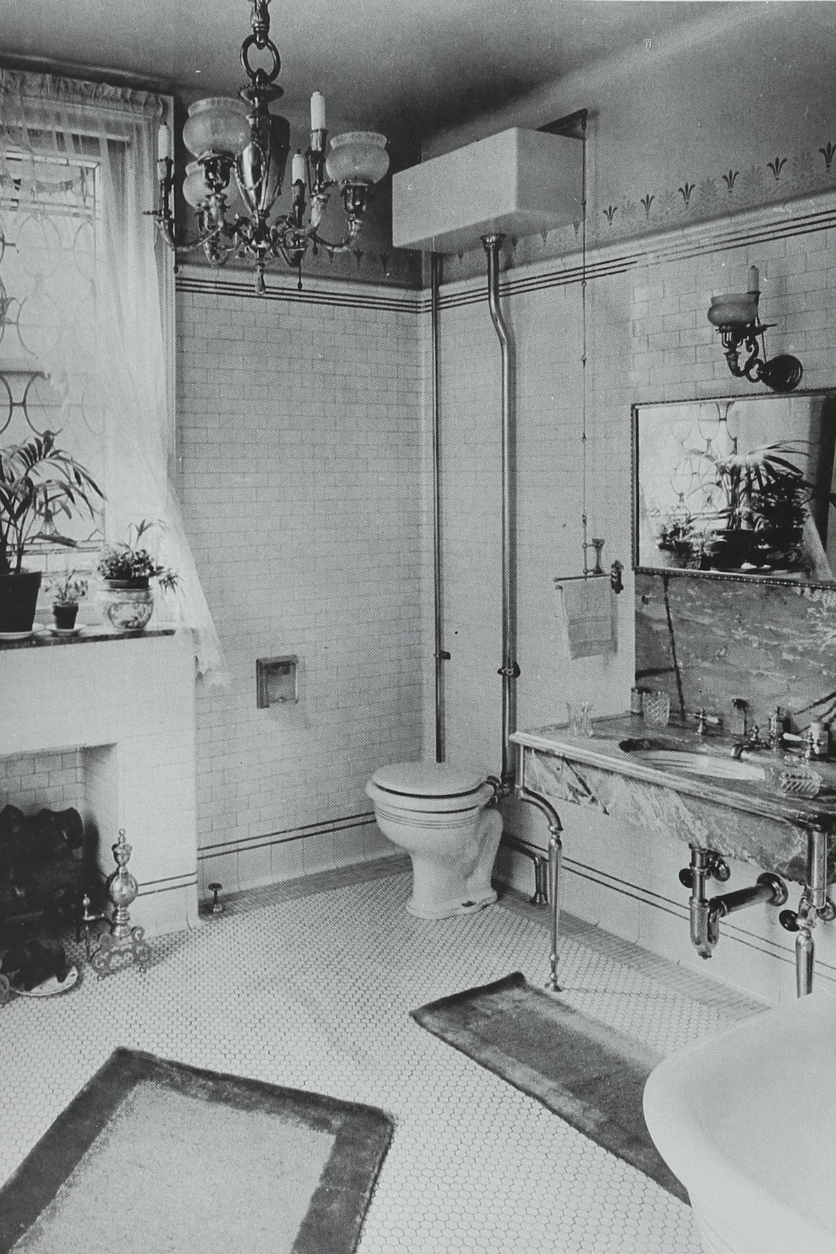 Luxurious vintage bathroom interior with marble vanity and chandelier