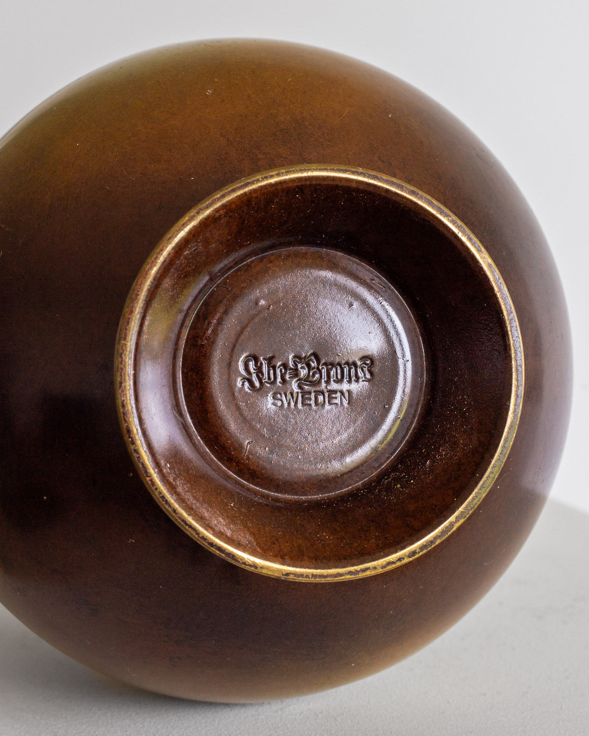 Art Deco bronze vase bottom view showing Sweden maker's mark