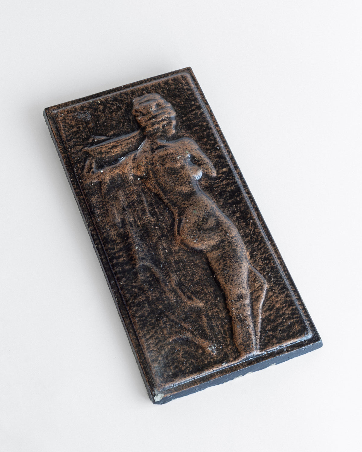 Vintage ceramic female figure relief sculpture in dark bronze glaze