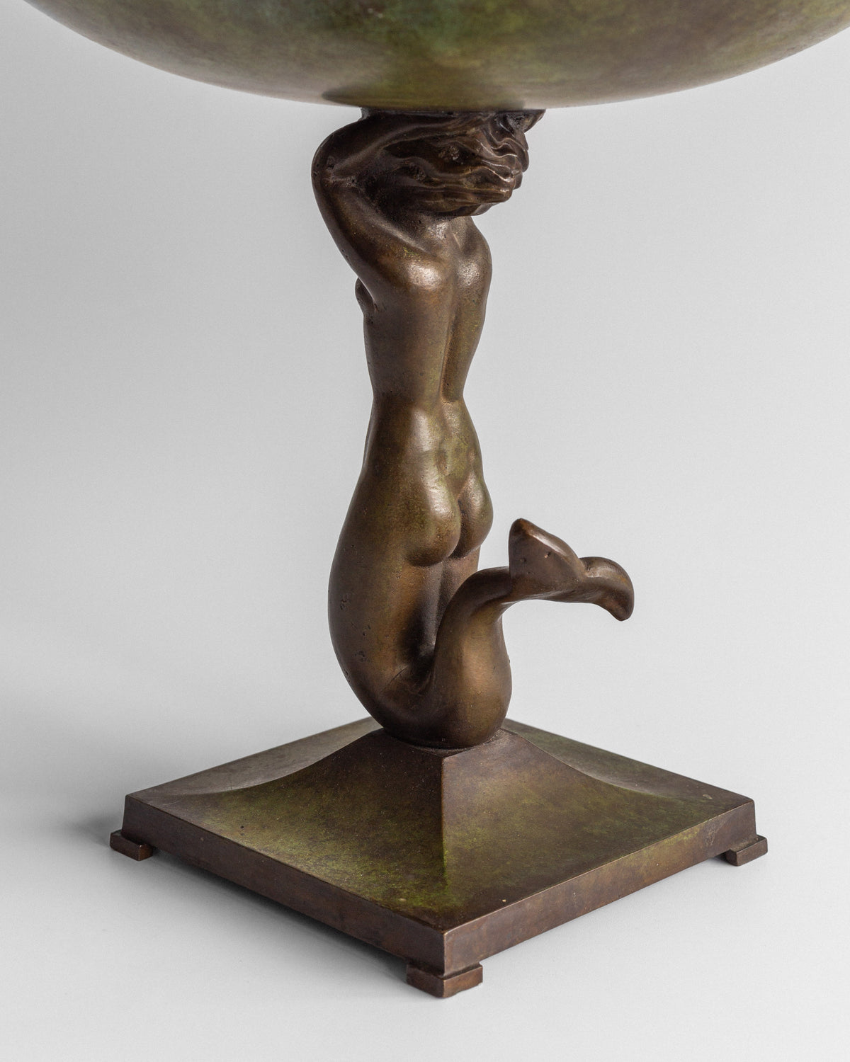Bronze mermaid base supporting Art Deco bowl from 1930s Sweden