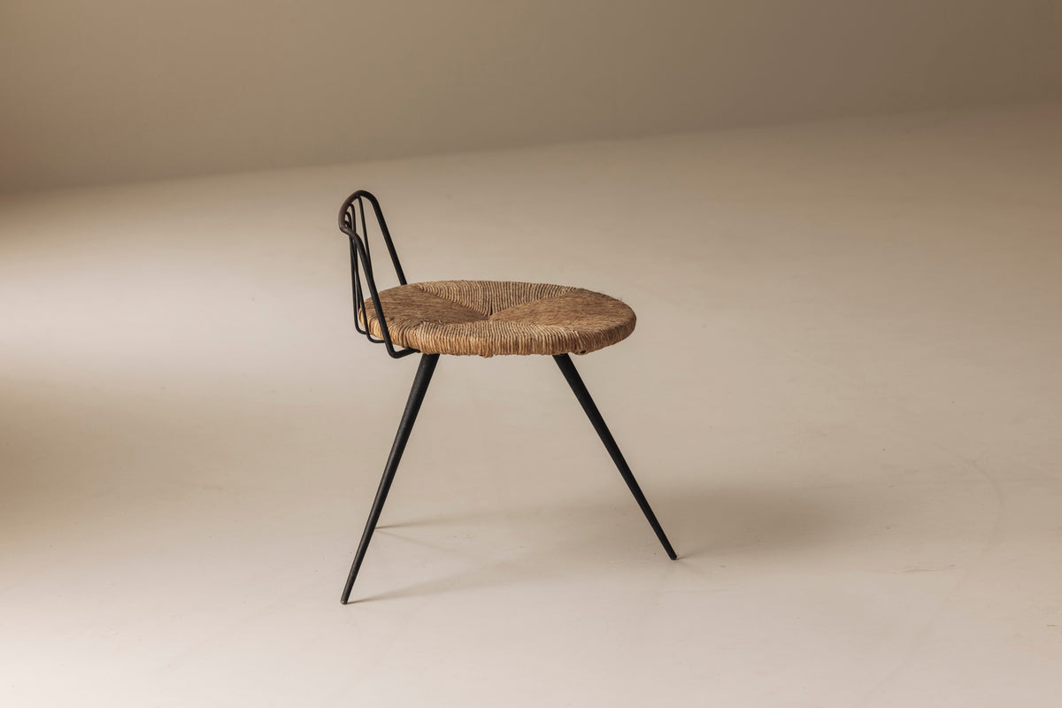 Rare French tripod stool in metal and rush, dating from the 1950s — in context