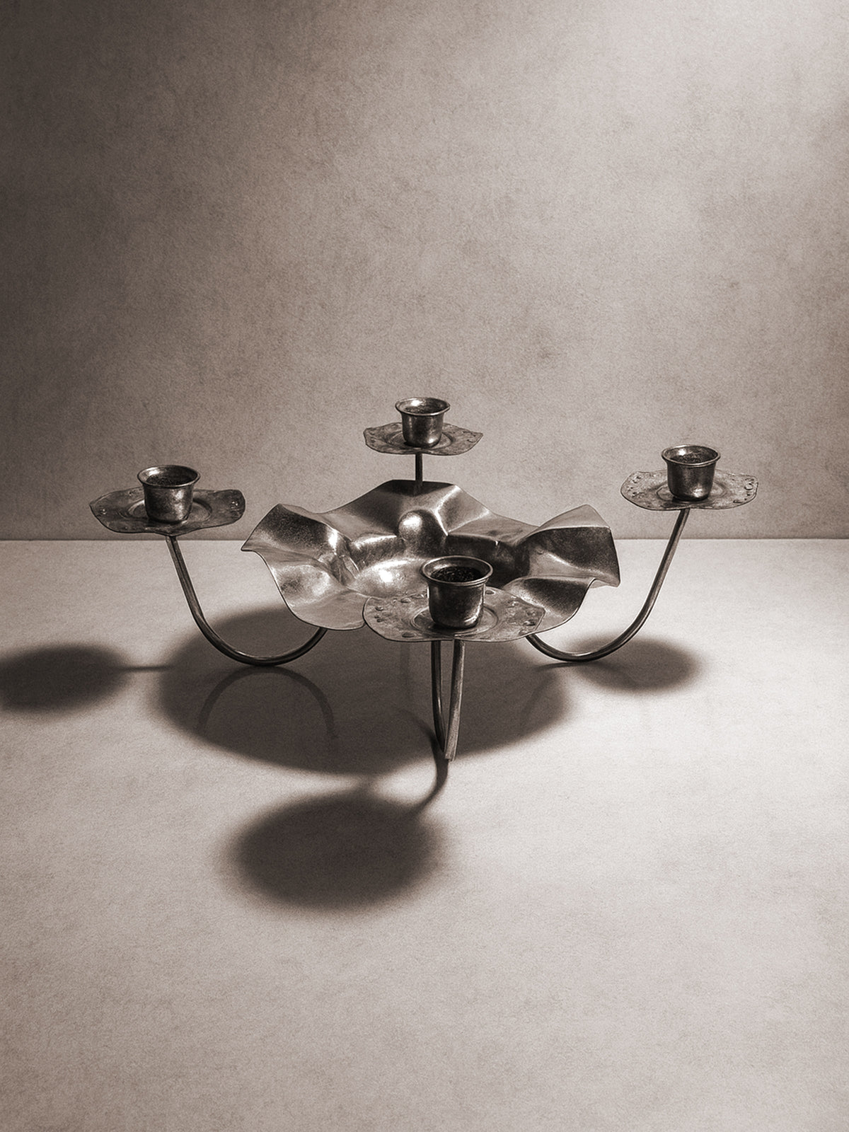 Silver Metal 1960s Candleholder — close-up of flower-shaped design