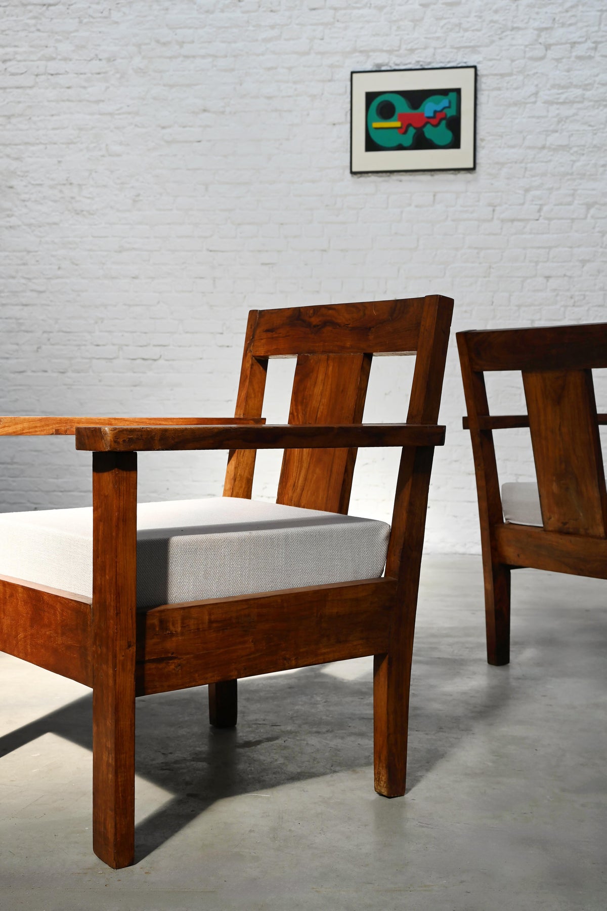 Pair of French Modernist Teak Armchairs, 1960s — lifestyle setting