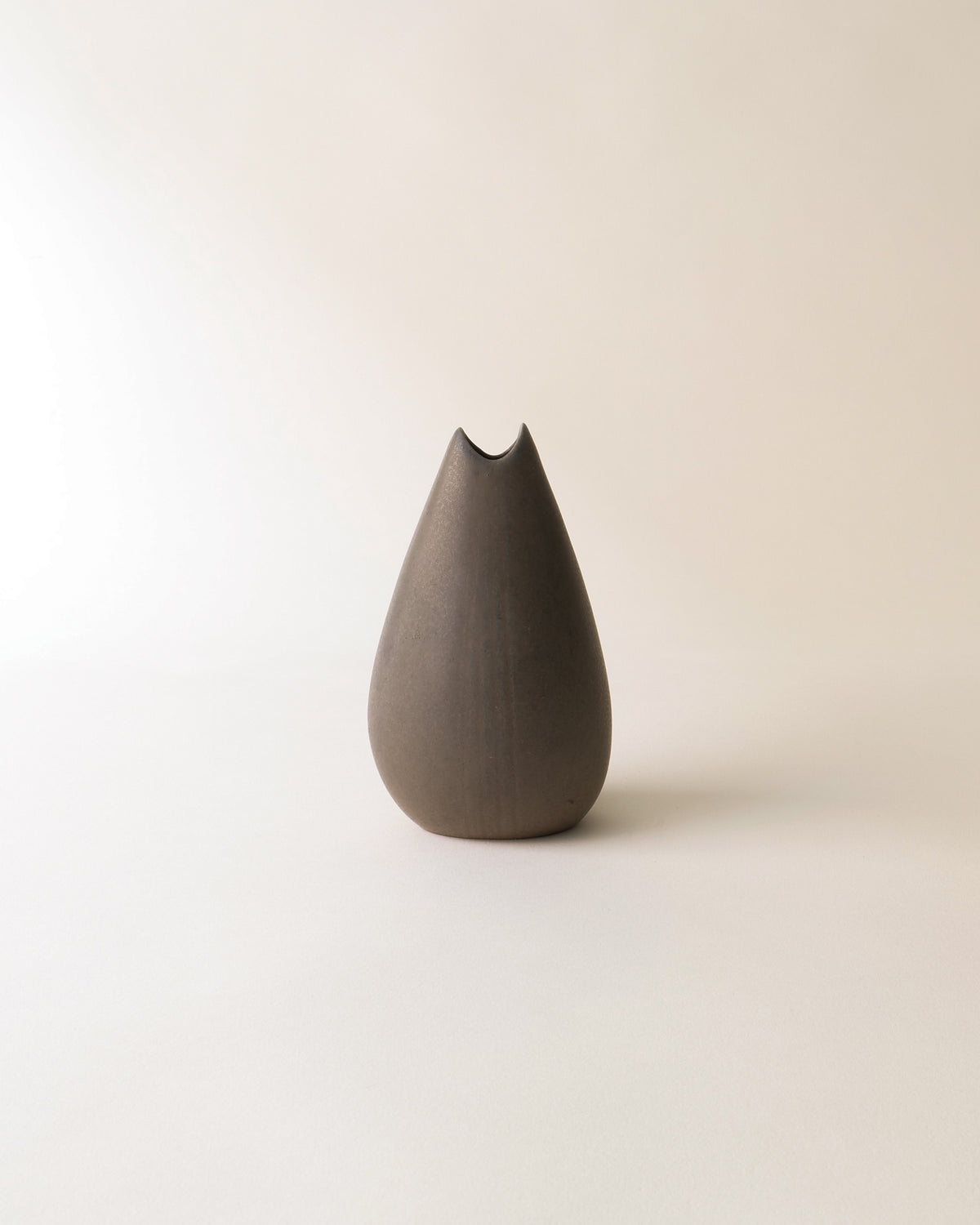 Vintage ceramic vase by Gunnar Nylund with distinctive notched rim