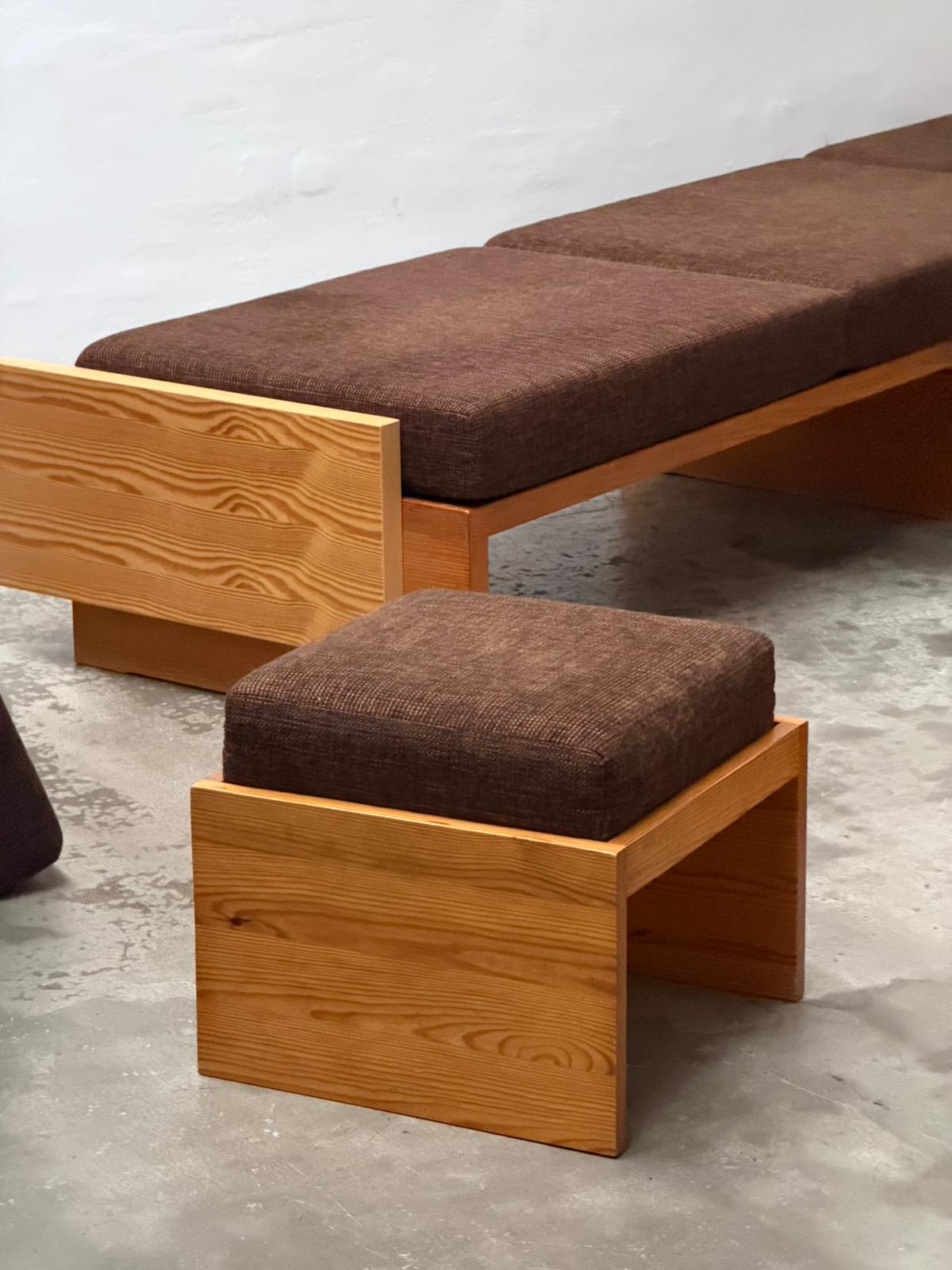 Modernist Benches and Stool, c.1970 — close-up of wooden frame and brown upholstery