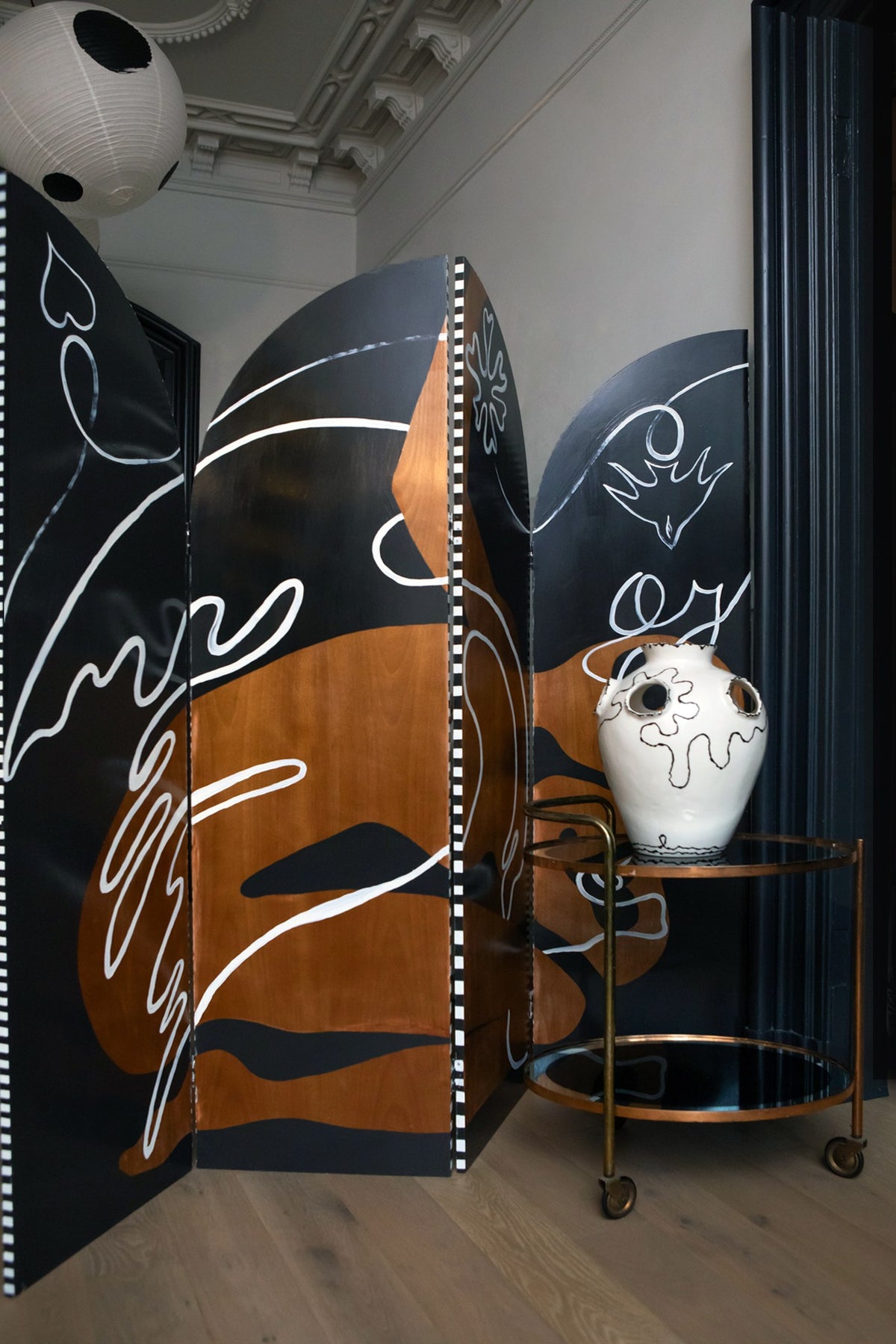 Stripe Side Screen — angled view in modern interior with decorative vase