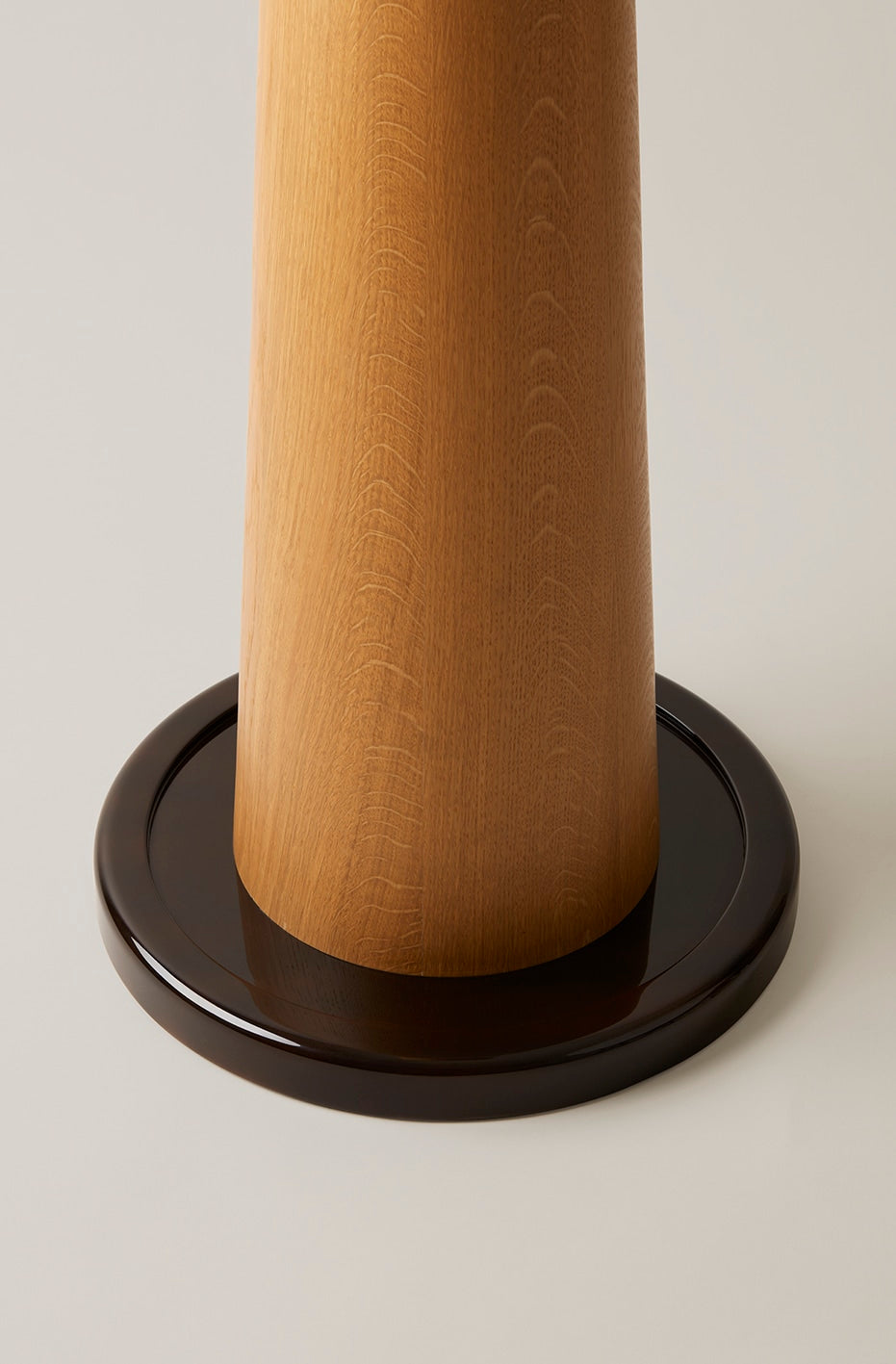 Base detail of Le Grand Fontainebleau floor lamp with wood finish