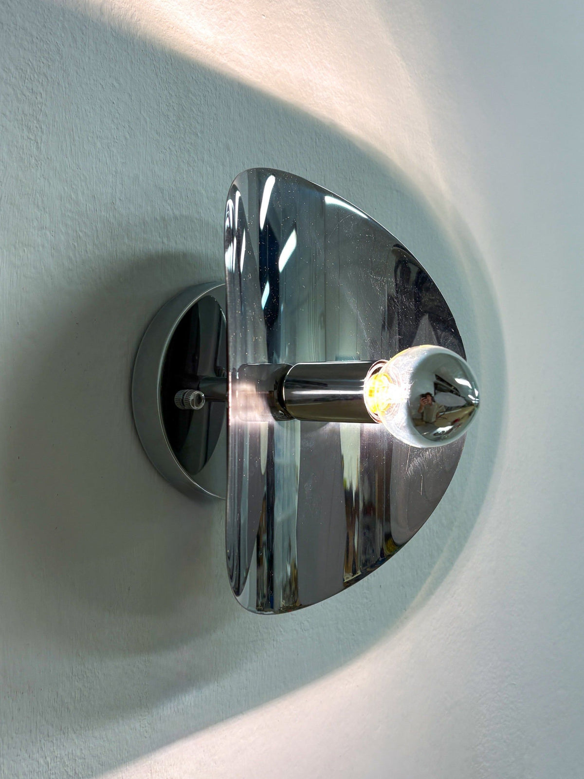 Folio Sconce, Chromed Metal, Italy, 1970s — angled view on white wall