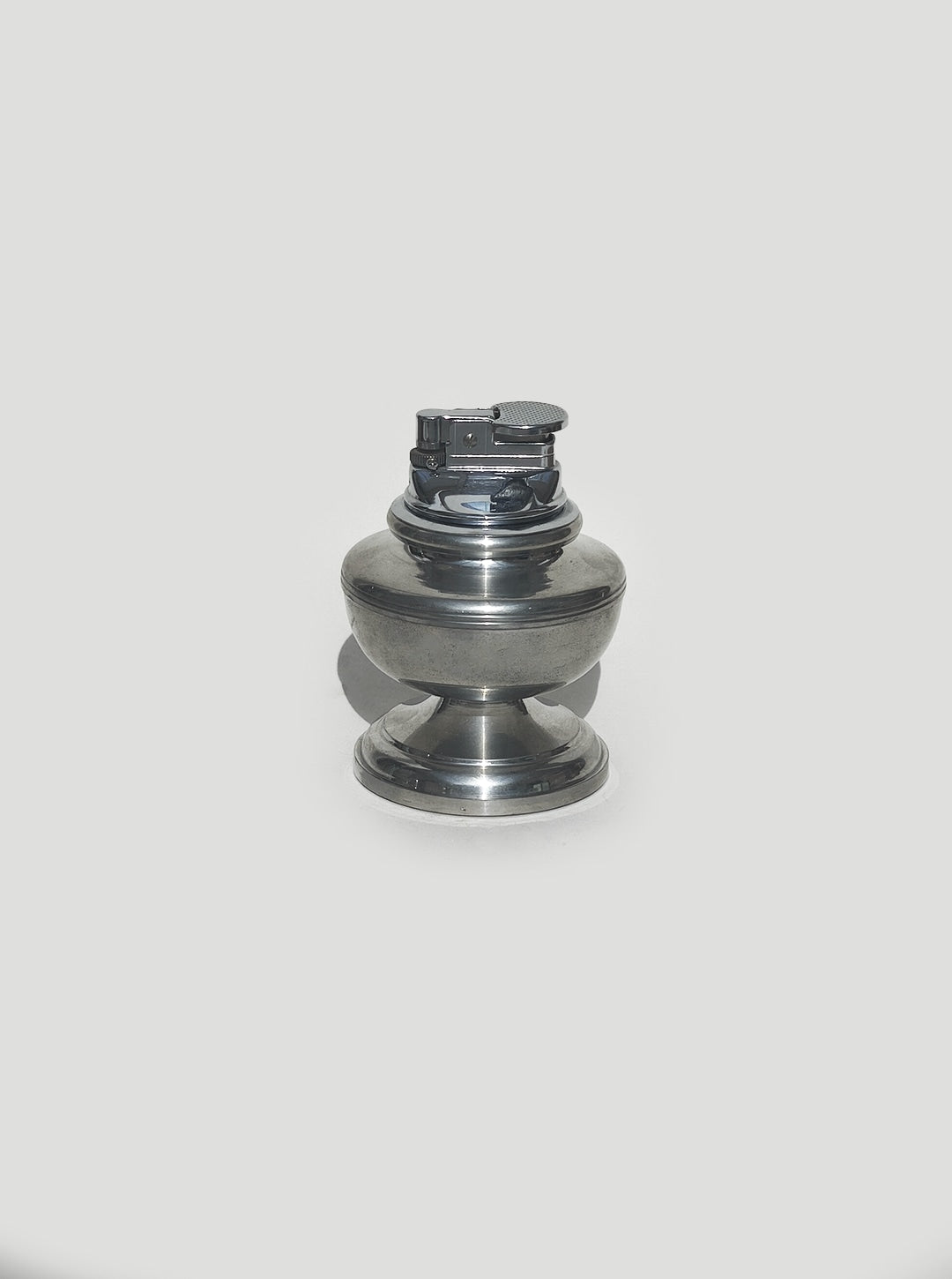 Pewter Lighter — side angle showing polished metal finish