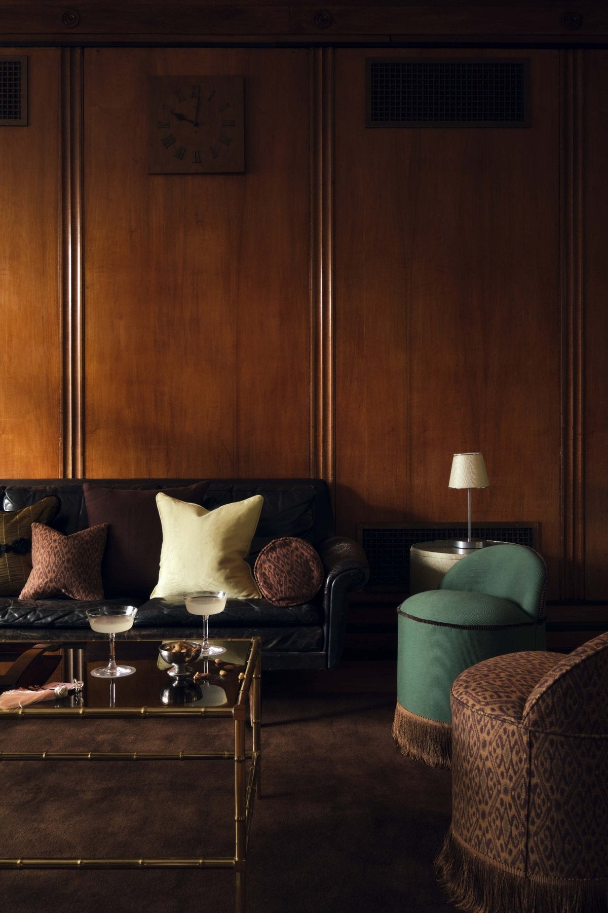 INFERI STOOL - WOVEN IKAT — styled in dark wood living room setting