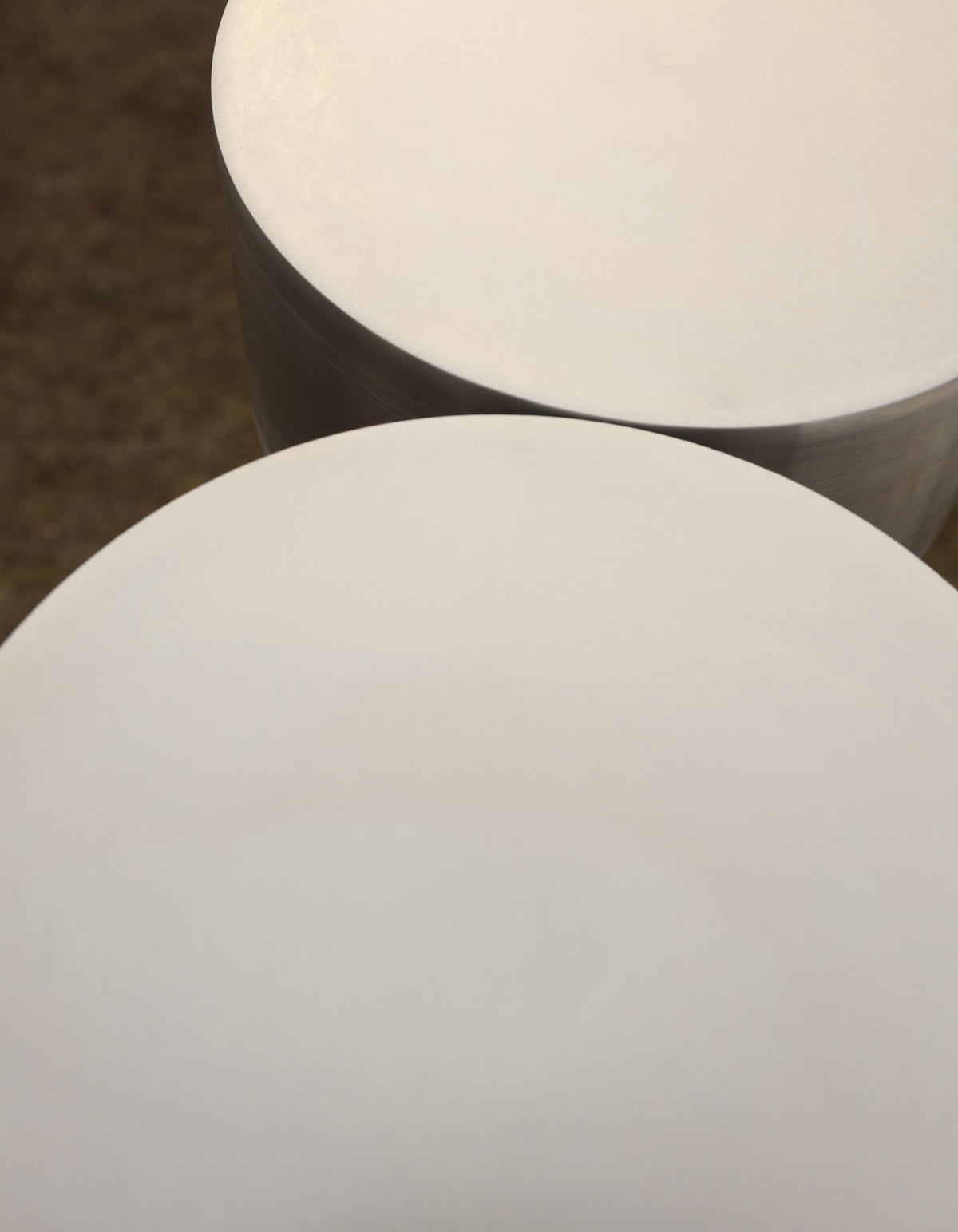 X floor lamp — close-up of smooth white ceramic shade