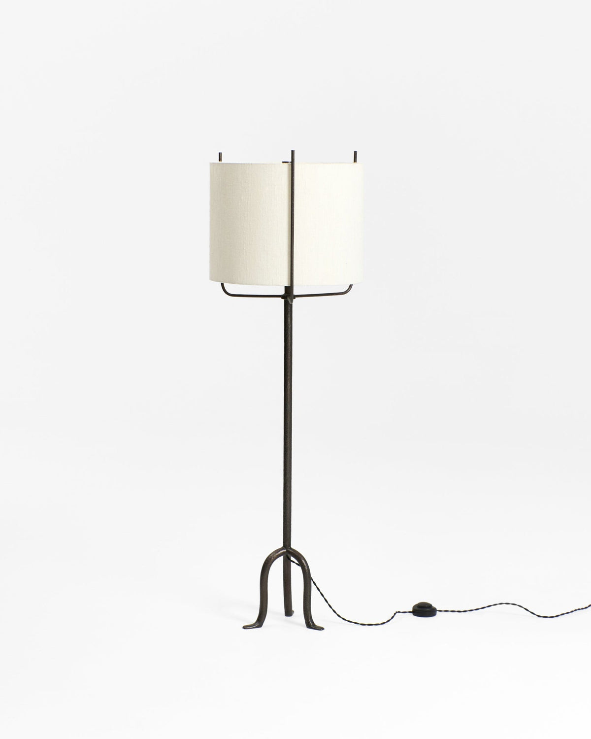 Amiga Floor Light — front view of black metal base and cream shade