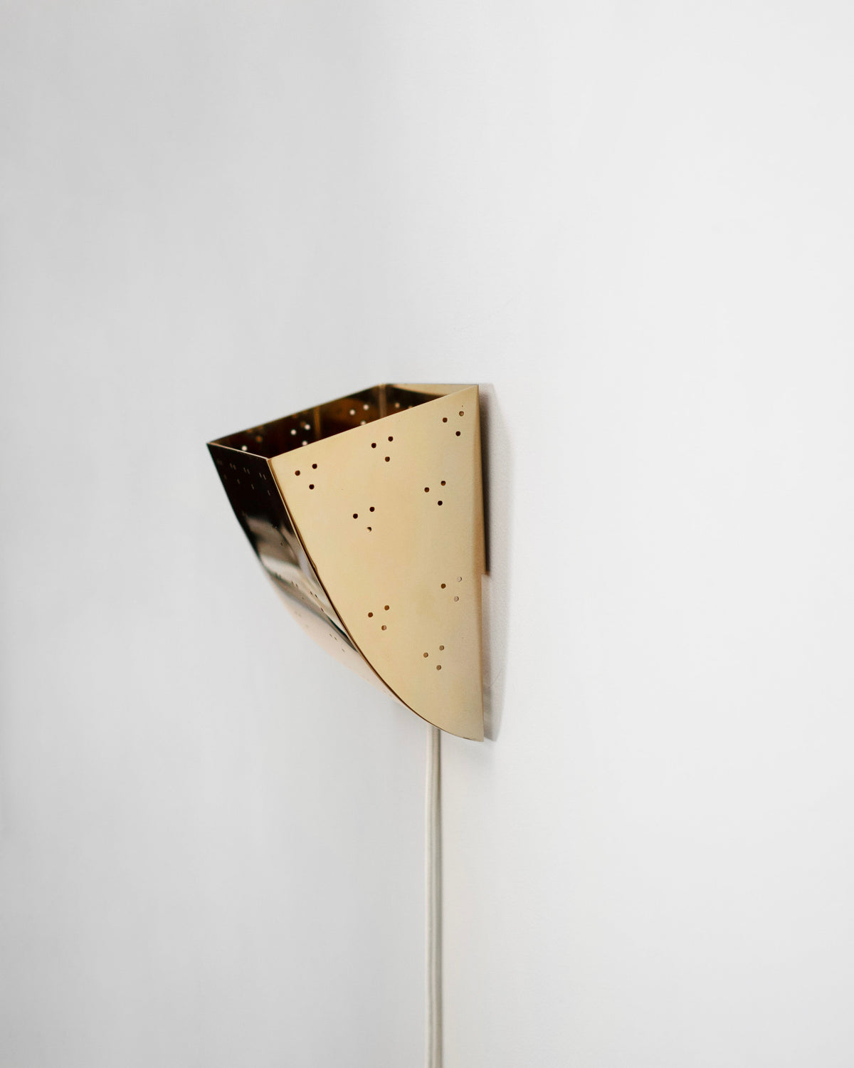 Jolene Wall Lamp - Polished Brass — back view highlighting perforated design
