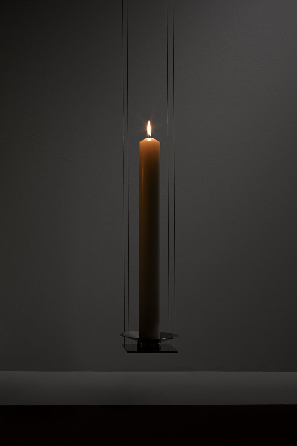WAN PENDANT — side angle showing candle in minimalist setting