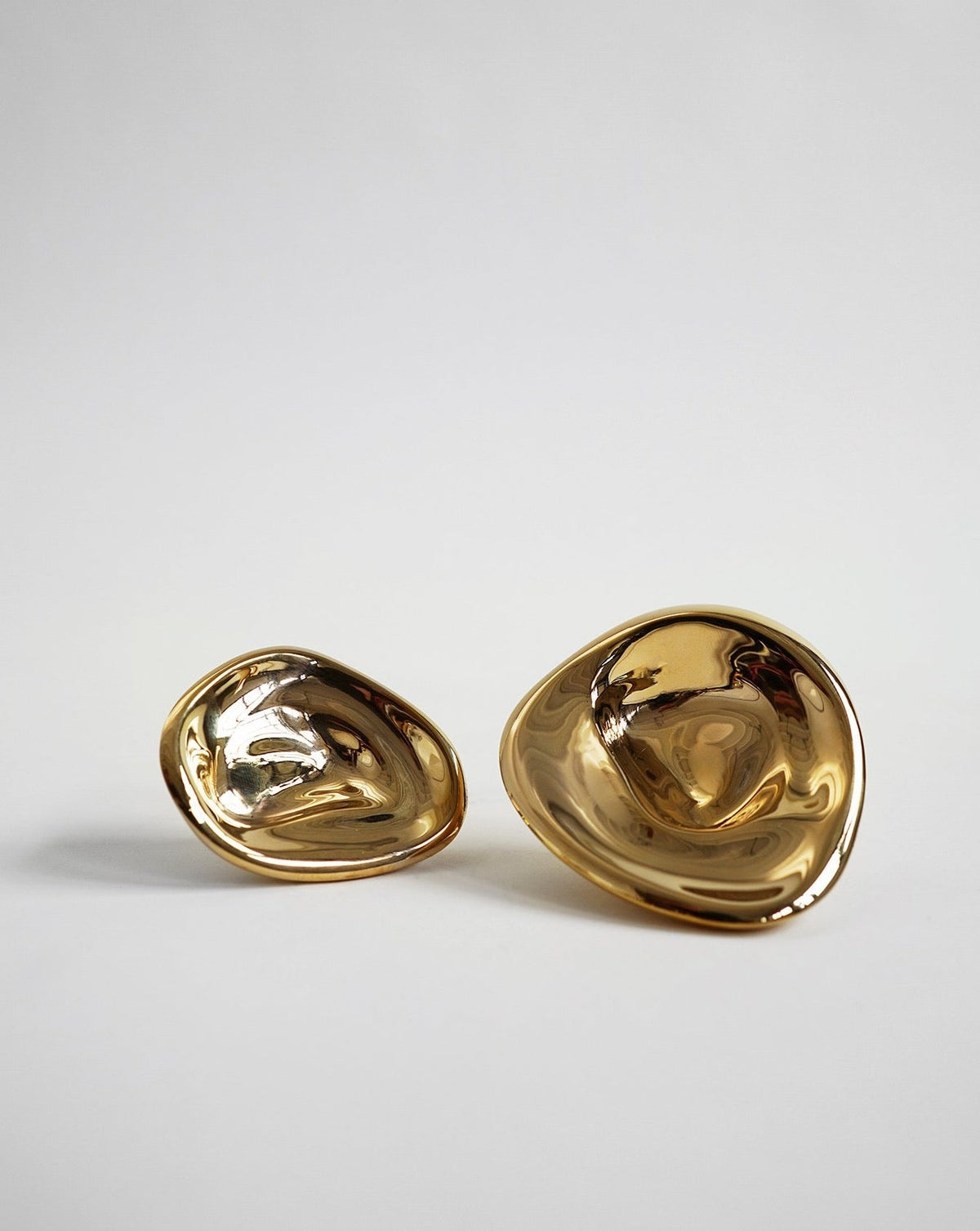 Ripple Hook - Large - Brass — top view of shiny brass surface