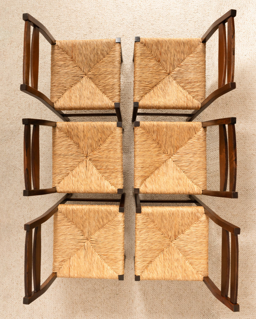 Six Italian woven rush seat chairs arranged in rows, 1960s vintage