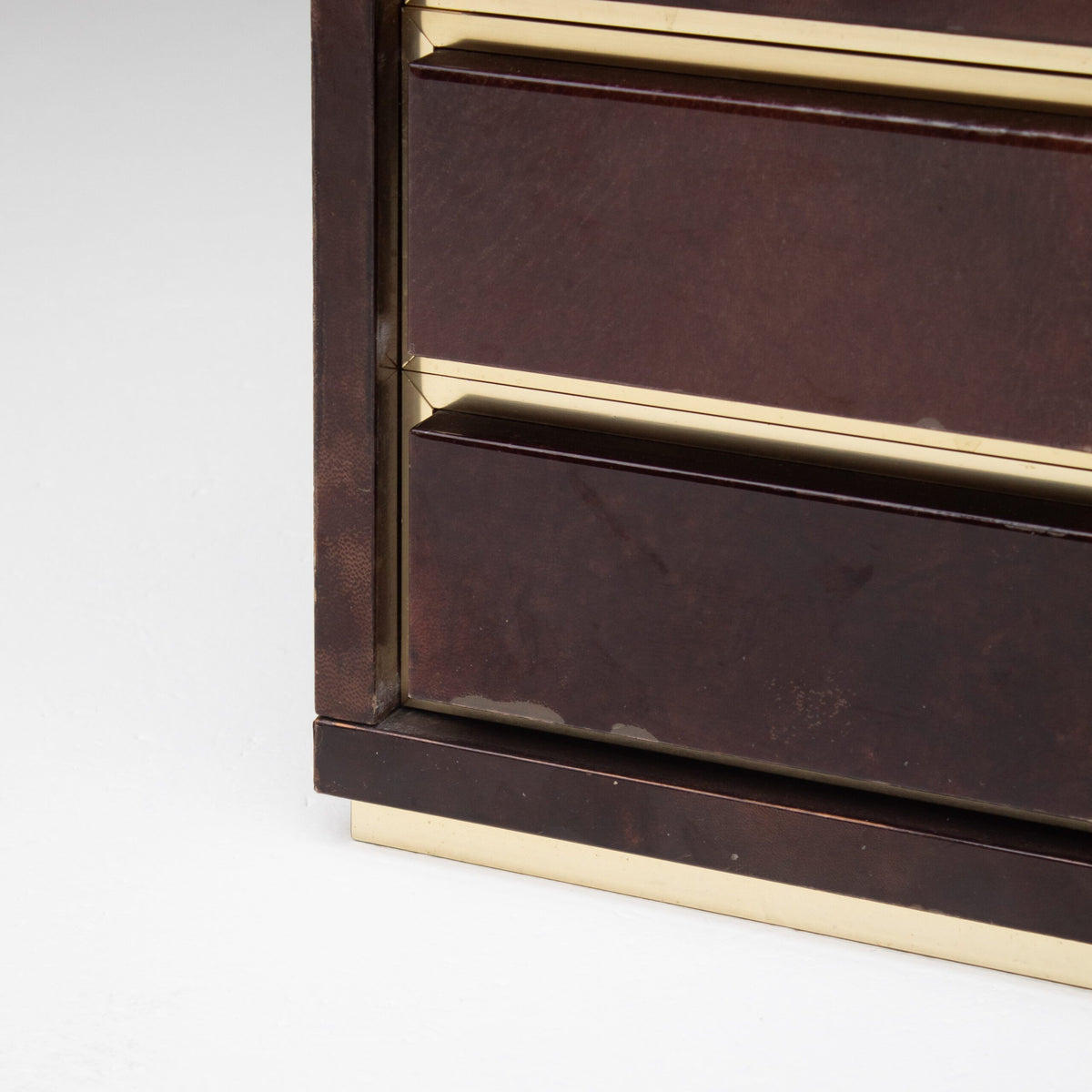 Pair of Aldo Tura (attr) Nightstands in Parchment and Brass — close-up of brass trim and drawer detail